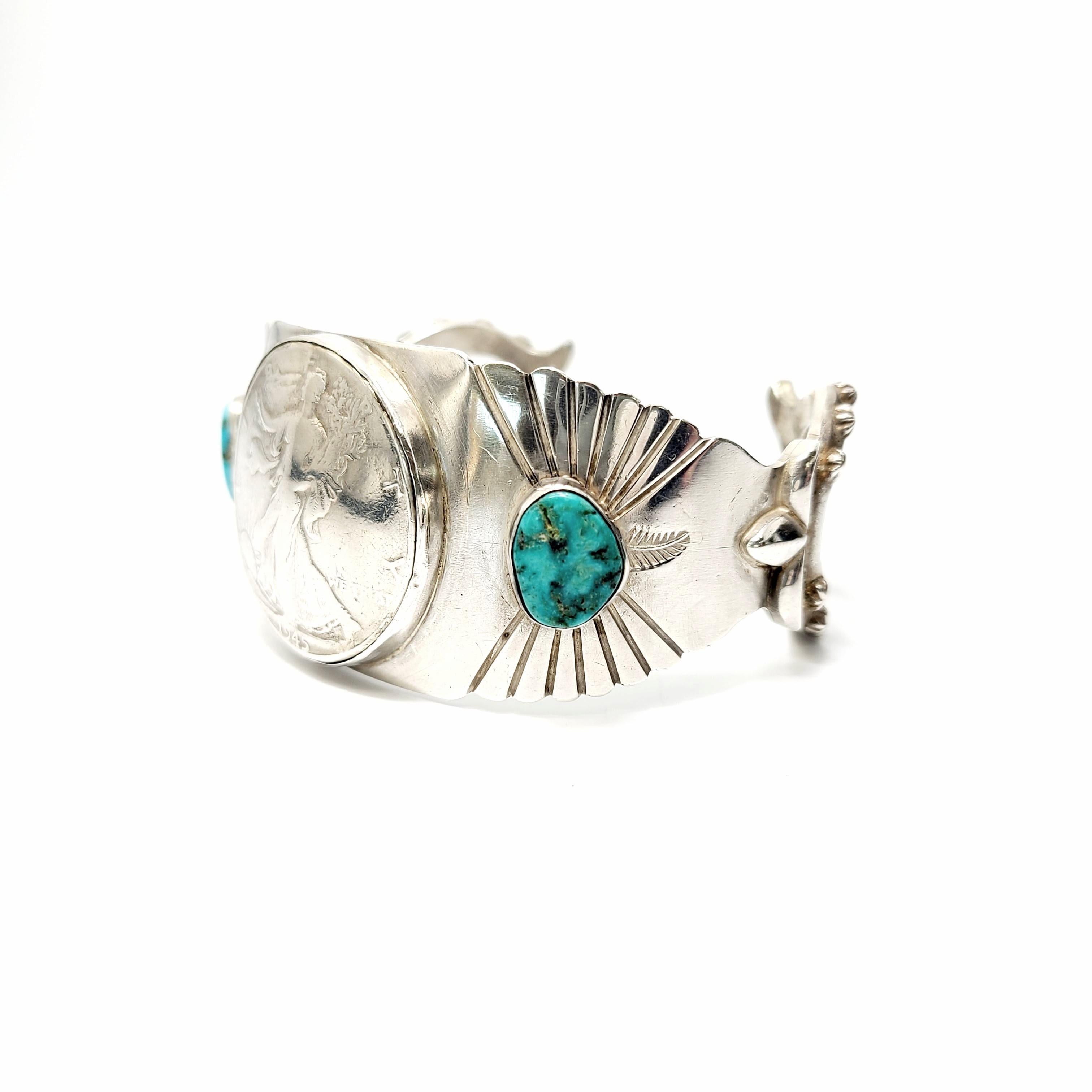 Wide sterling silver cuff bracelet with Walking Liberty half dollar and turquoise from Running Bear Shop.

Running Bear was a trader shop in business since the 1970s in Gallup, NM. This piece features a 1945 Walking Liberty half dollar coin at it's