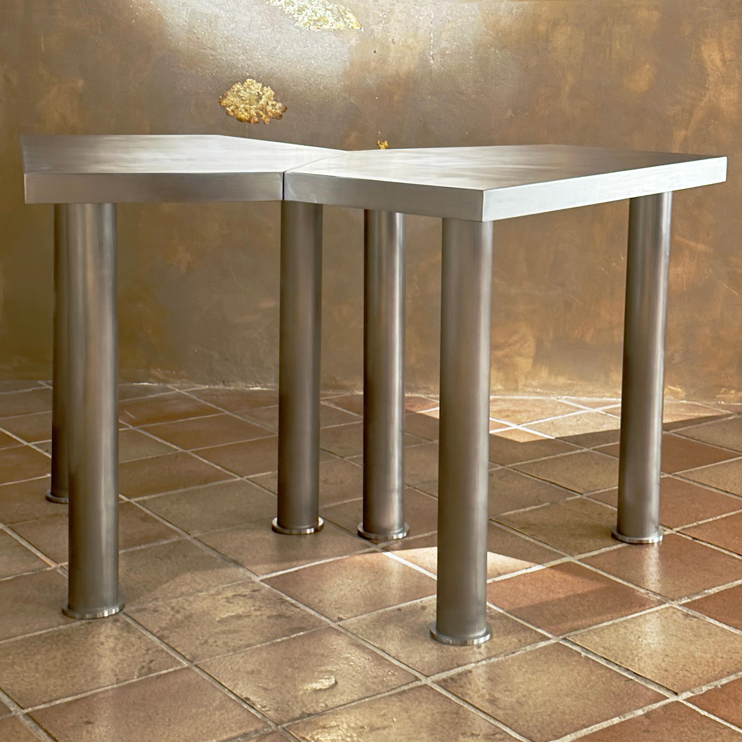 “Running Gun” Accent Table Set, Iron, JAMES VINCENT MILANO, Italy, 2023

Pentagonal accent table with removable tripod legs. 
For use individually or as extensions to complete “Running Gun” Dining Table.
Polished and brushed iron.
Handcrafted