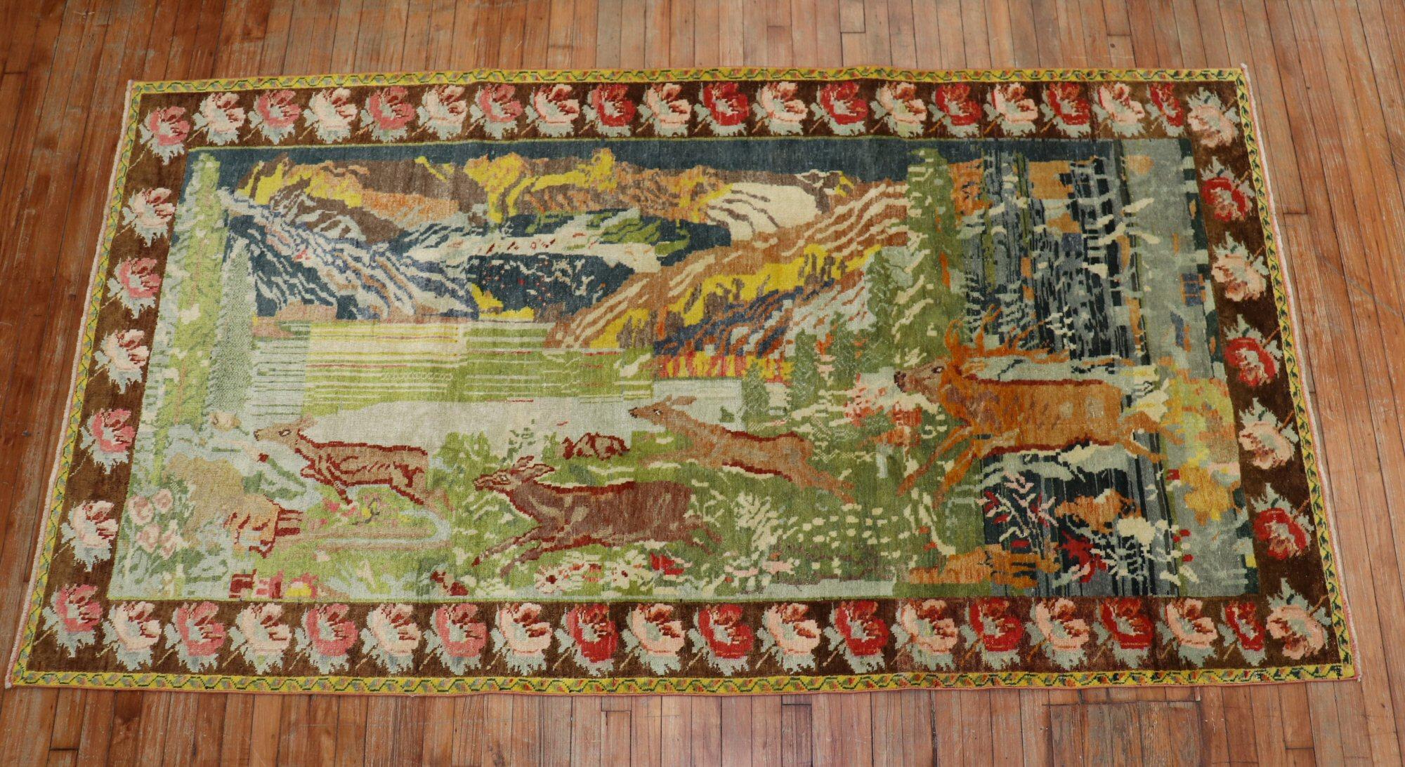 Schöner russischer Karabagh-Teppich aus der Mitte des 20. Jahrhunderts mit 4 laufenden Hirschen auf landschaftlichem Hintergrund und brauner Blumenbordüre.

Maße: 4'9