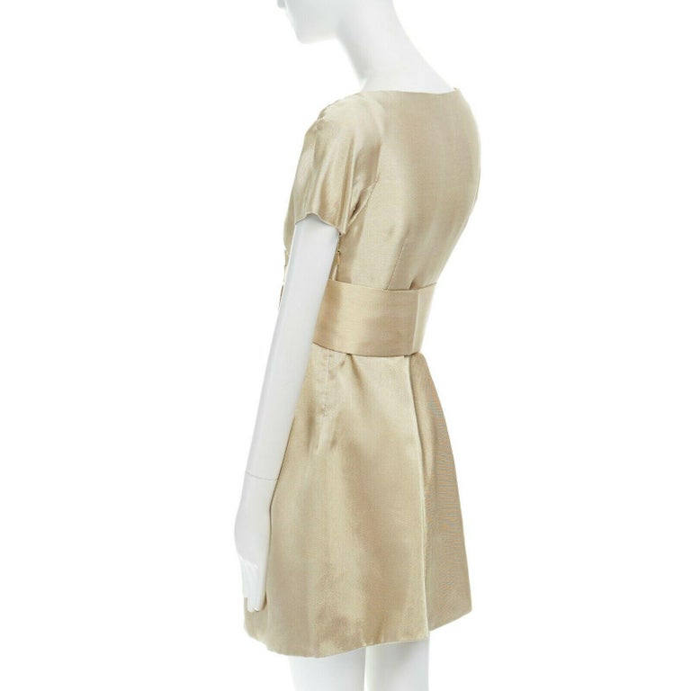 sachin and babi light blue dress Sold at Auction: AN ALEXANDER MCQUEEN EMERALD GREEN CHIFFON COCKTAIL DRESS,  'THE MAN WHO KNEW TOO MUCH', AUTUMN/WINTER 2005-06 main image 1