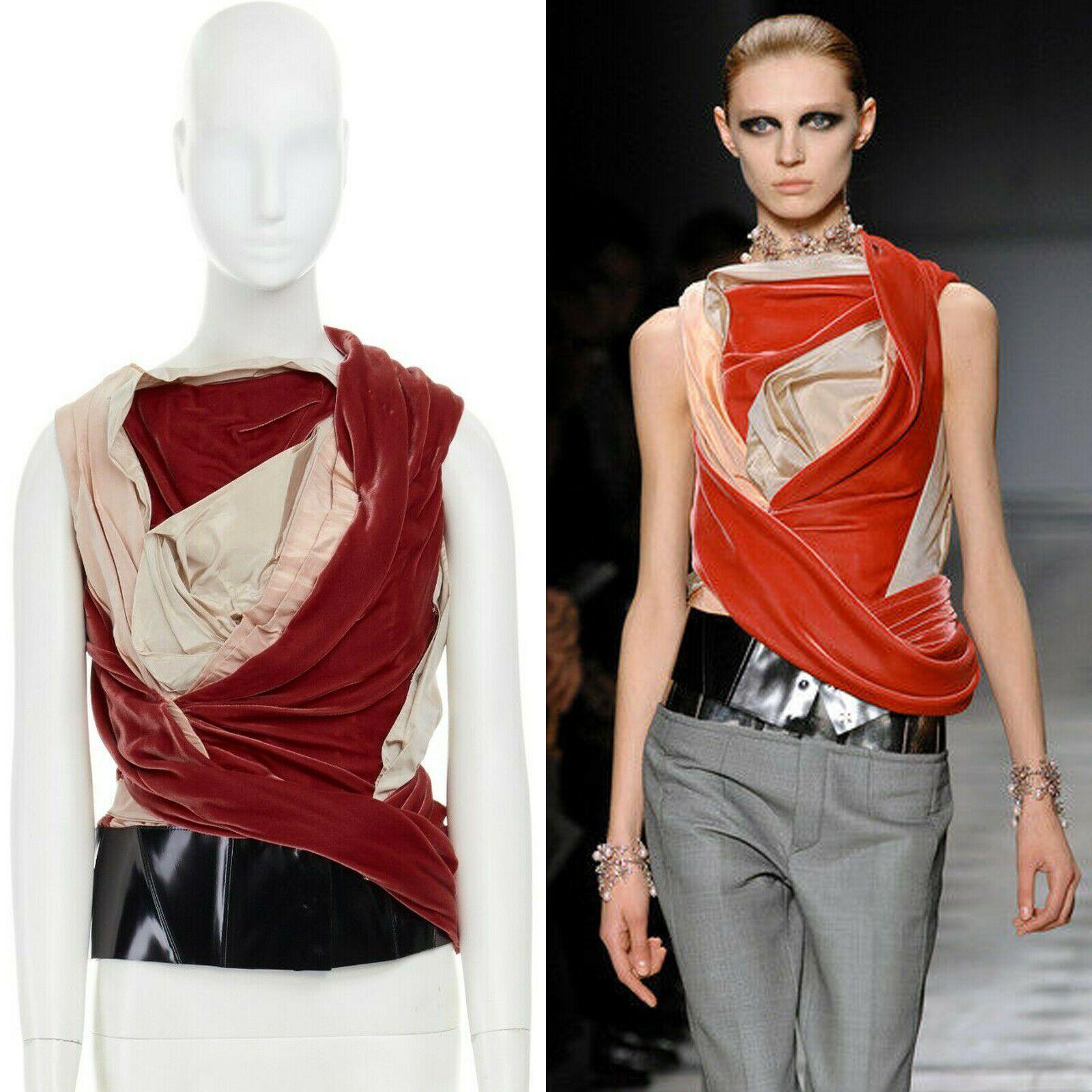 runway BALENCIAGA GHESQUIERE AW08 red draped velvet corset top FR38 US6 UK10

BALENCIAGA by NICHOLAS GHESQUIERE
FROM THE FALL WINTER 2008 RUNWAYAS 
SEEN ON: BLUE SEEN ON KEIRA KNIGHTLY ON AMERICAN VOGUE SEPTEMBER ISSUE COVERVISCOSE, RAYON, SILK .