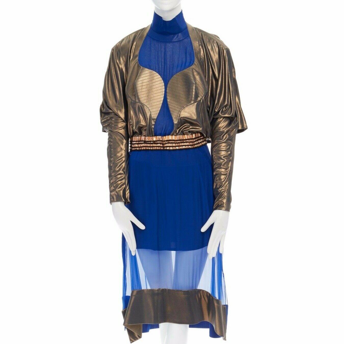 BALENCIAGA by NICHOLAS GHESQUIERE
FROM THE FALL WINTER 2012 RUNWAY 
SILK, RAYON, COTTON, AGNELLO, POLYESTER, POLYURETHANE • BLUE SILK BASE • SCULPTED BUST • MOCK HIGH NECKLINE • CONTOUR METALLIC BUST • SCULPTED STITCHING ON BUST • METALLIC COPPER