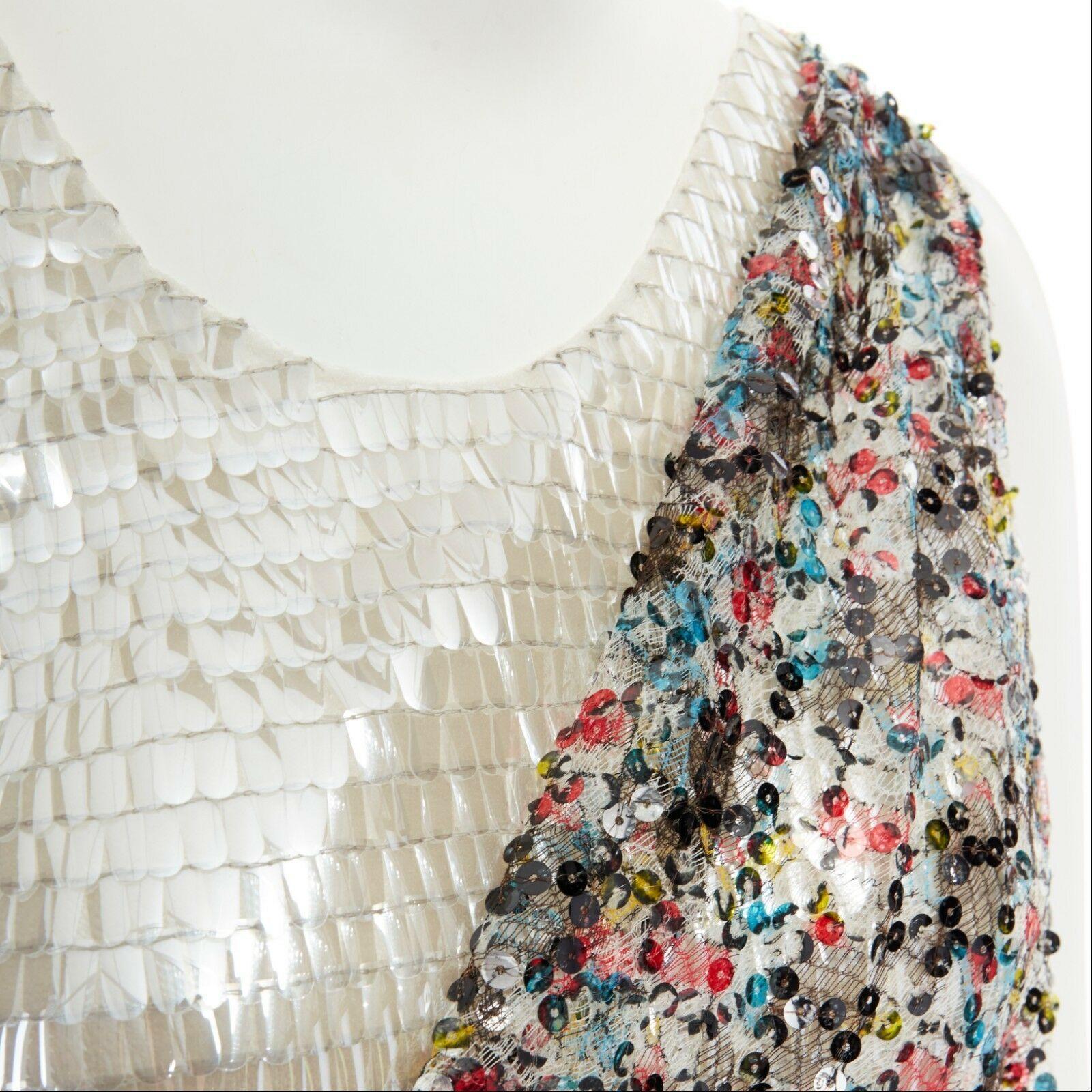 runway BALENCIAGA GHESQUIERE SS11 sequins lace pailette layer dress FR36 US4 UK8

BALENCIAGA by NICHOLAS GHESQUIERE
FROM THE SPRING SUMMER 2011 RUNWAY AND CAMPAIGN
POLYAMIDE, POLYESTER, RAYON, COTTON . PEARL PAILETTE UNDERLAY . 
MULTICOLOR PRINTED