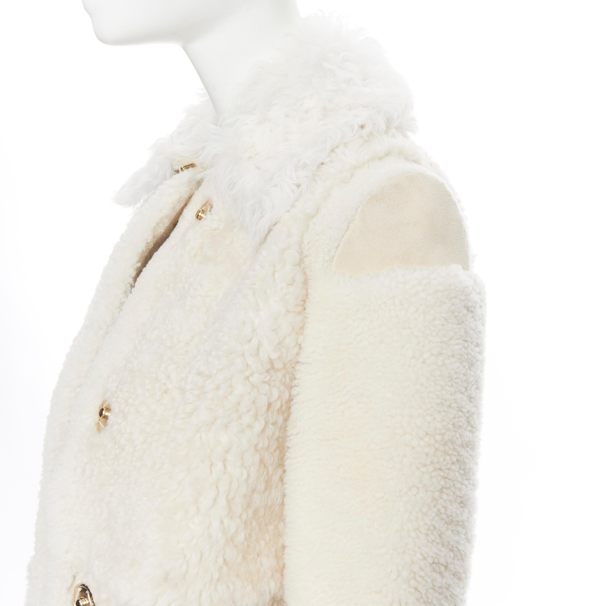 runway BURBERRY PRORSUM ivory sheep shearling shaved panel winter coat IT36 XS
Brand: Burberry
Designer: Christopher Bailey
Model Name / Style: Shearling coat
Material: Fur
Color: Beige
Pattern: Solid
Closure: Snap
Extra Detail: 100% genuine sheep