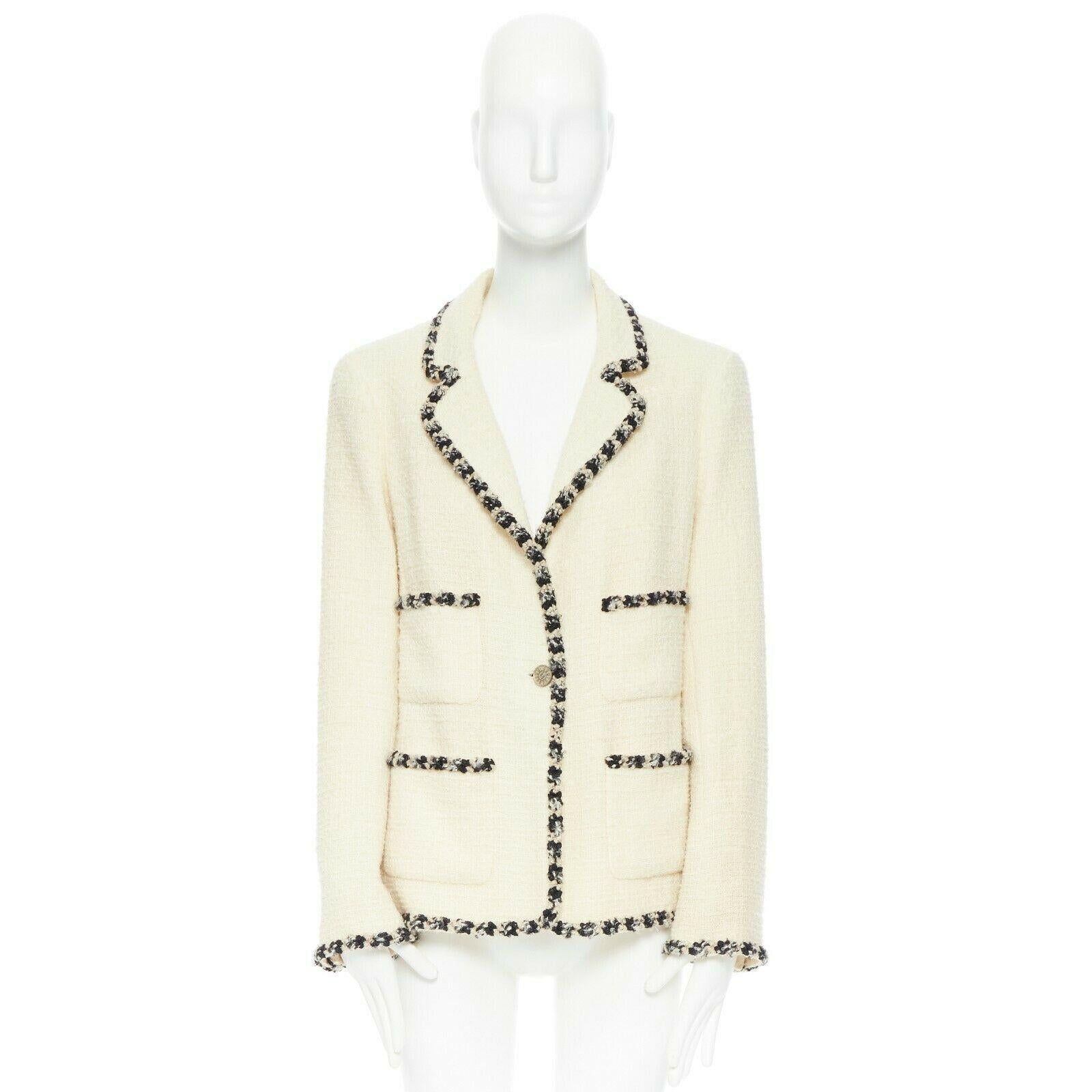 runway CHANEL 06A cream tweed black trim lapel 4 pocket school boy jacket FR46
Brand: CHANEL
Designer: Karl Lagerfeld
Collection: 06A
Model Name / Style: Tweed jacket
Material: Wool blend
Color: Ecru
Pattern: Solid
Closure: Button
Lining material: