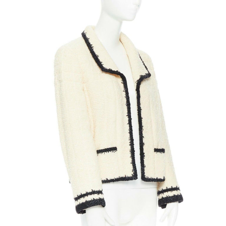 runway CHANEL 06A Vogue ecru frosted wool tweed black trim quilted