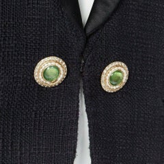 runway CHANEL 12A Paris-Bombay tweed satin tuxedo with green jewel button FR44