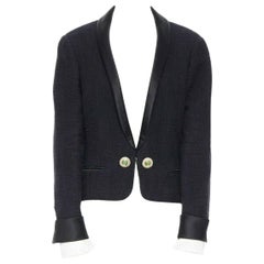 runway CHANEL 12A Paris-Bombay tweed satin tuxedo with green jewel button FR44