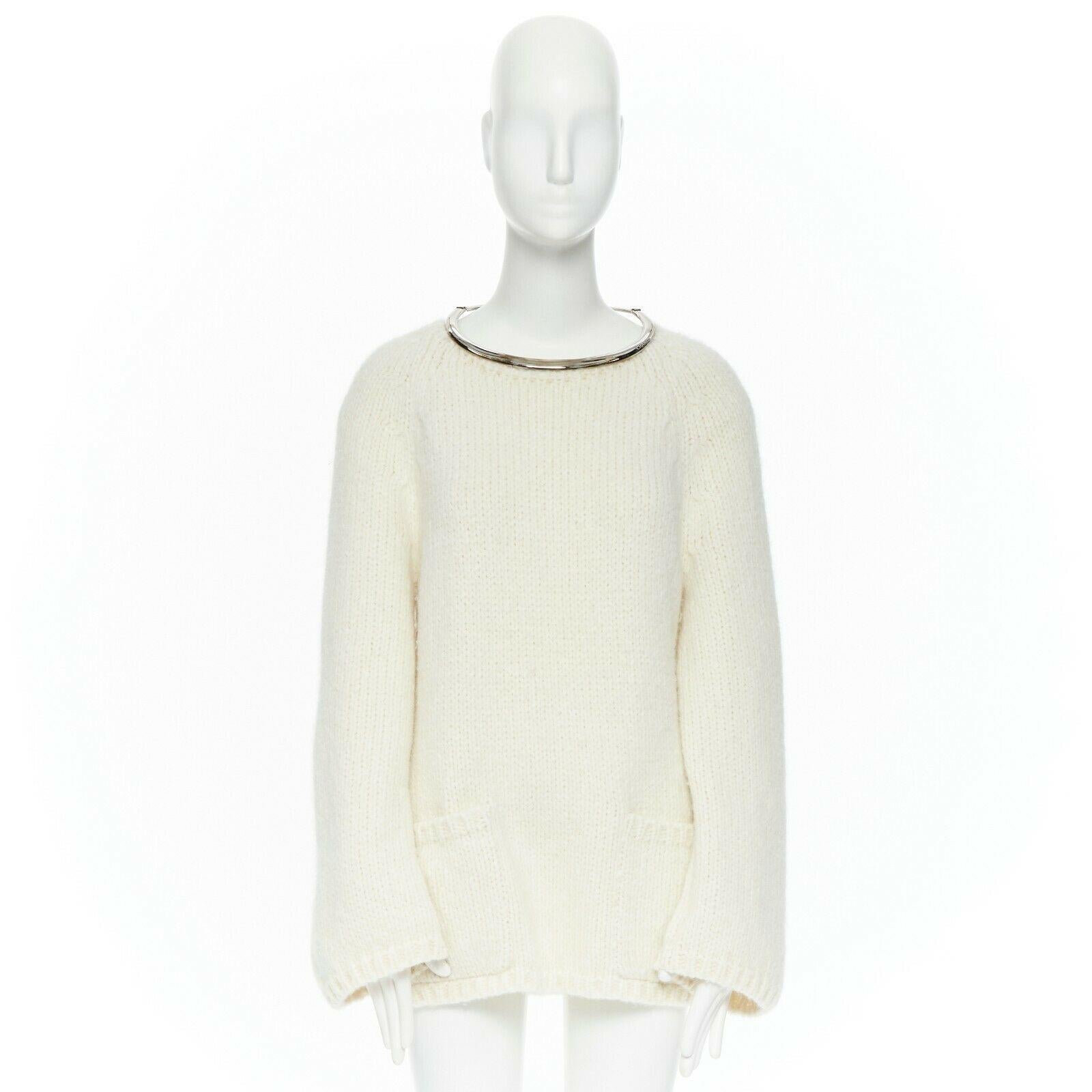 runway CHANEL 18A white alpaca knit dual patch pocket oversized sweater FR42
Brand: CHANEL
Designer: Karl Lagerfeld
Collection: 18A
Model Name / Style: Sweater
Material: Alpaca
Color: Ecru
Pattern: Solid
Closure: Pullover
Extra Detail: Cable knit