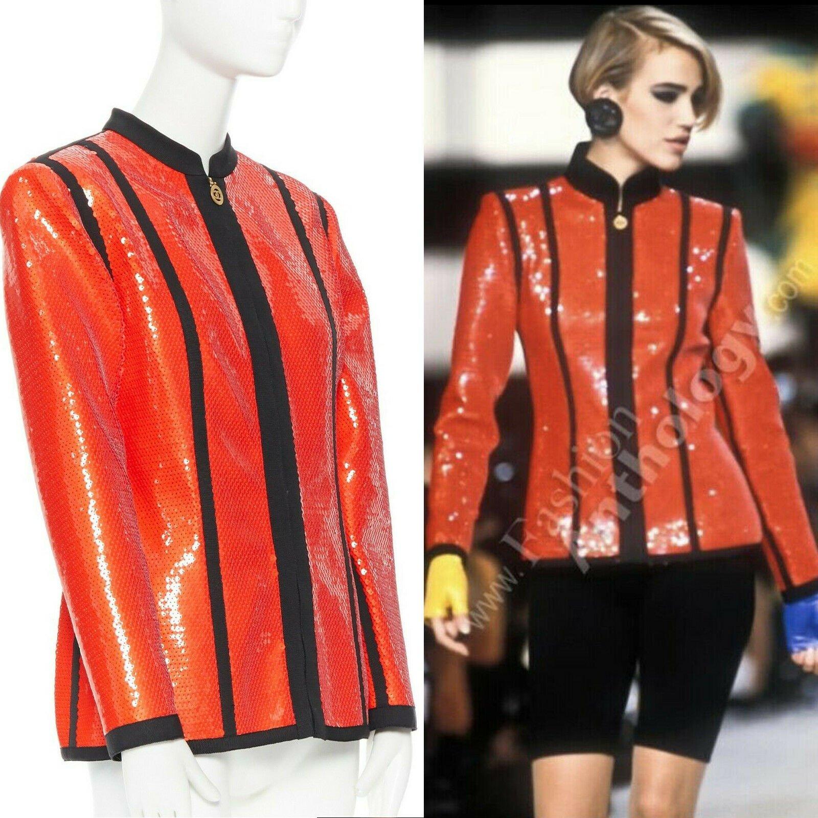 runway CHANEL 91P vintage red sequin black trim scuba suit zip CC jacket FR44 
Reference: ZING/A00087
Brand: Chanel 
Designer: Karl Lagerfeld 
Collection: Spring Summer 1991 Runway 
Material: Polyester 
Color: Red 
Pattern: Solid 
Closure: Zip