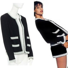 runway CHANEL 94P iconic black boucle tweed white rubber braid jacket FR38 rare