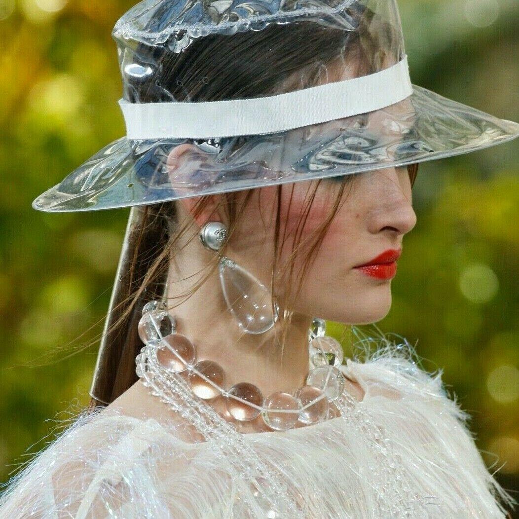 runway CHANEL KARL LAGERFELD SS18 clear resin ball linked choker necklace
Brand: CHANEL
Designer: Karl Lagerfeld
Collection: 18P
Model Name / Style: Resin choker
Material: Plastic; resin
Color: White
Pattern: Solid
Closure: Lobster 
Extra Detail: