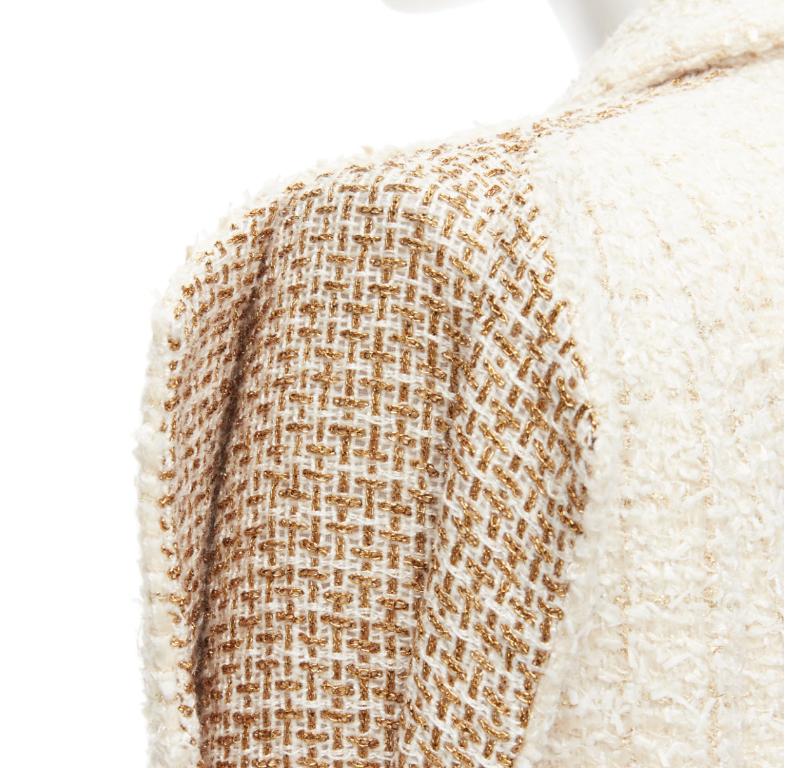 Runway CHANEL Paris Cosmopolite gold ecru Fantasy tweed split shoulder jacket 46
Reference: BMPA/A00166
Brand: Chanel
Designer: Karl Lagerfeld
Collection: 17A Paris Cosmopolite Metier D'Art - Runway
Material: Wool
Color: Ecru
Pattern: Solid
Closure: