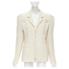 Veste de défilé CHANEL Paris Cosmopolite en tweed écru doré à épaules fendues 46