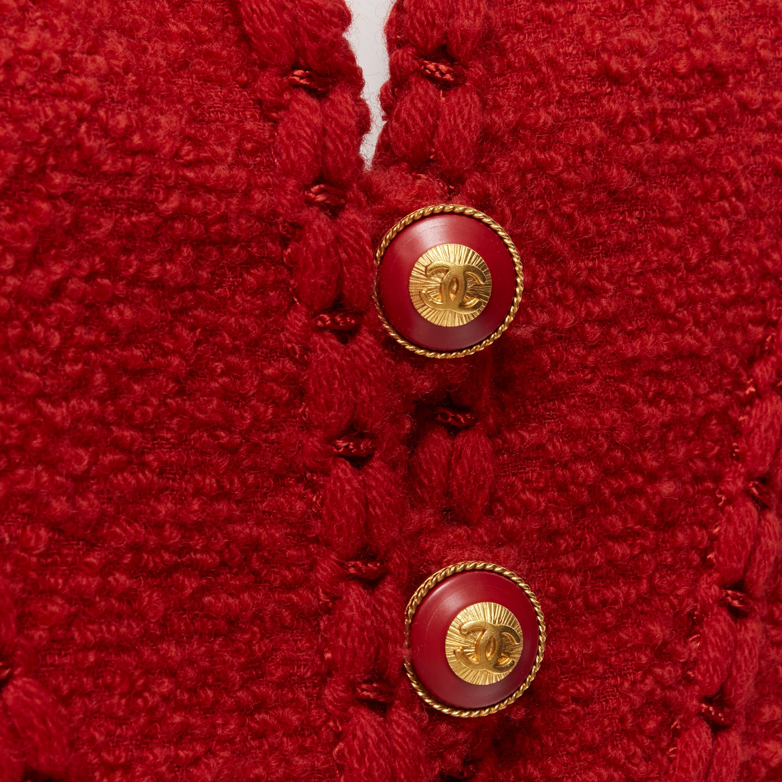 Runway CHANEL Vintage 93A red boucle tweed boned corset  jacket FR44
Brand: Chanel
Designer: Karl Lagerfeld
Collection: 93A 
Material: Wool
Color: Red
Pattern: Solid
Closure: Button
Extra Detail: Red boucle tweed. Notched collar. Shoulder padded.