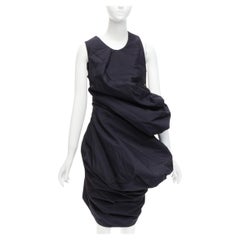 runway COMME DES GARCONS 1997 Lumps Bumps black circle cut asymmetric dress S