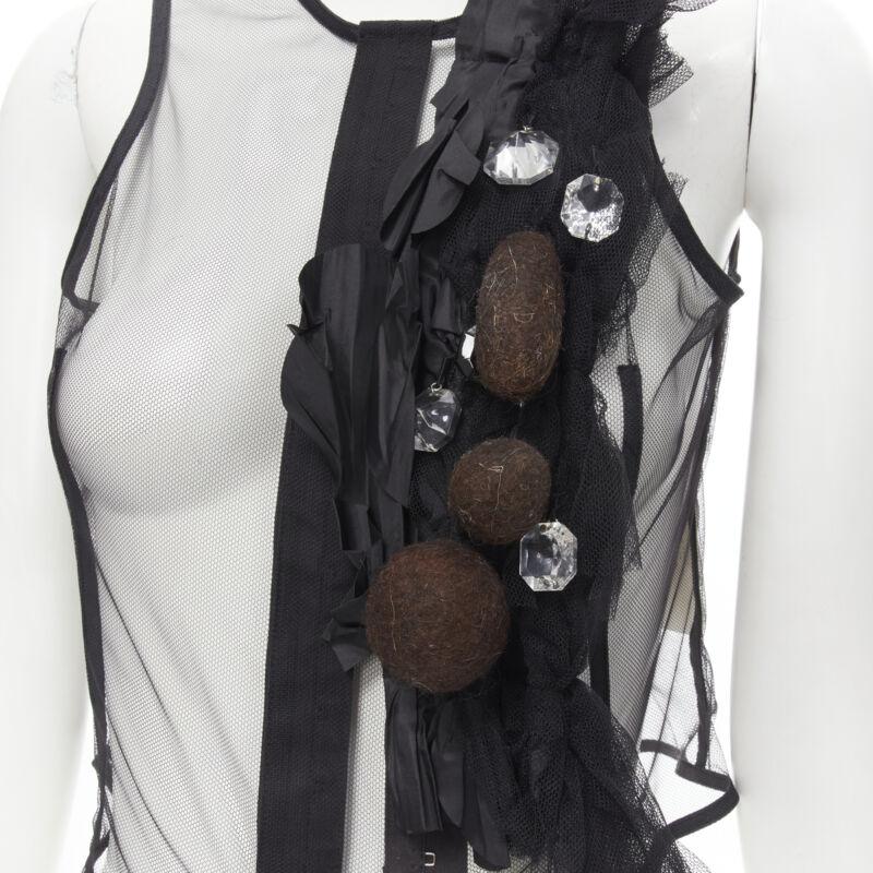 Runway COMME DES GARCONS 2004 black sheer mesh jewel embellishment ruffle vest S
Reference: CRTI/A00475
Brand: Comme Des Garcons
Designer: Rei Kawakubo
Collection: 2004 - Runway
Material: Viscose
Color: Black
Pattern: Solid
Closure: Hook & Eye
Extra