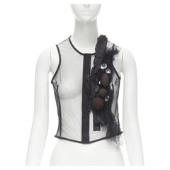 Laufsteg COMME DES GARCONS 2004 Schwarze geraffte Weste aus transparentem Netz mit Juwelenverzierung S