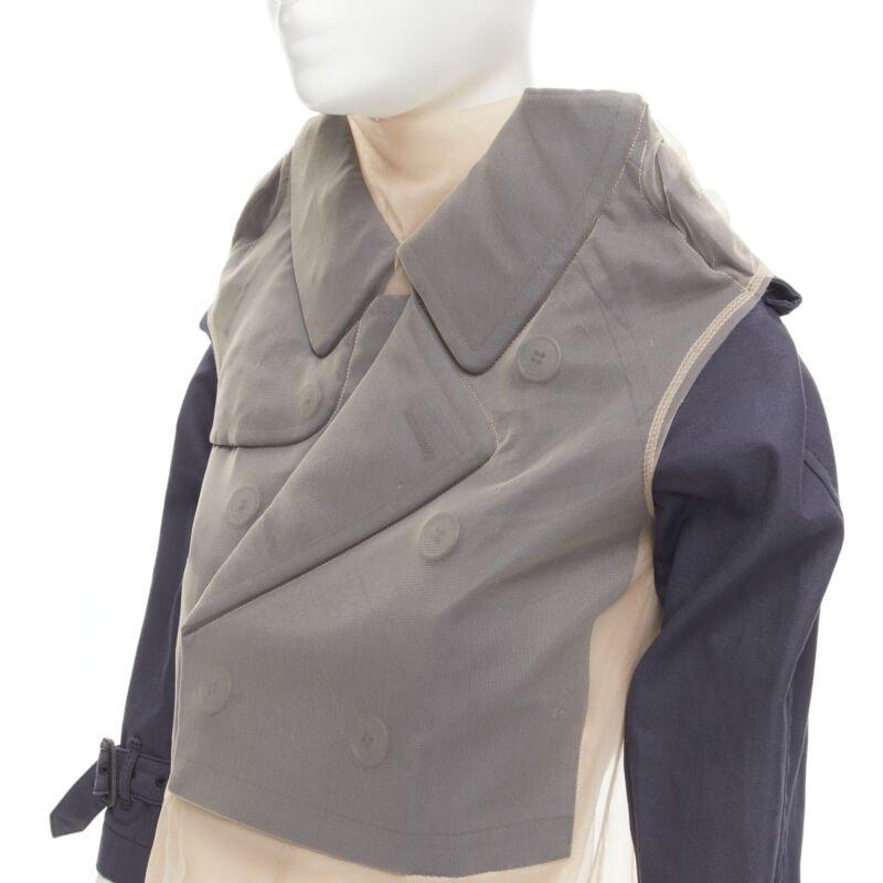 Runway COMME DES GARCONS 2009 navy blue cropped trench sheer mesh wrapped top S
Reference: CRTI/A00528
Brand: Comme Des Garcons
Designer: Rei Kawakubo
Collection: 2009 - Runway
Material: Cotton
Color: Blue, Beige
Pattern: Solid
Extra Details: