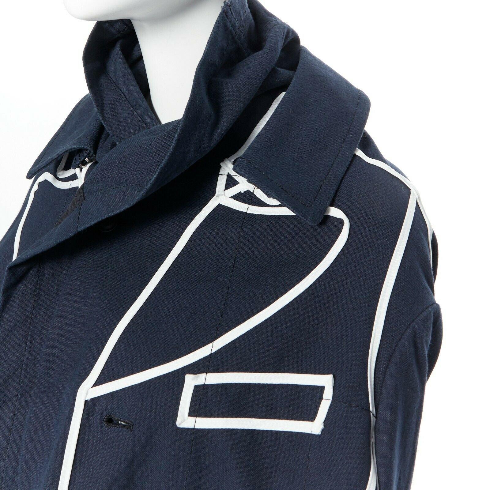 runway COMME DES GARCONS AW09 REI KAWAKUBO navy blue trompe l'oeil coat jacket S 
Reference: TGAS/A03226 
Brand: Comme Des Garcons 
Designer: Rei Kawakubo 
Collection: Fall Winter 2009 Runway 
Material: Cotton 
Color: Navy 
Pattern: Solid 
Closure: