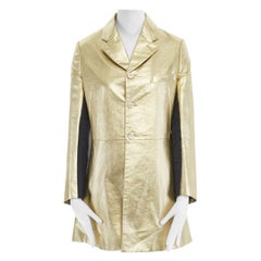 runway COMME DES GARCONS AW11 gold faux leather open back deconstructed jacket