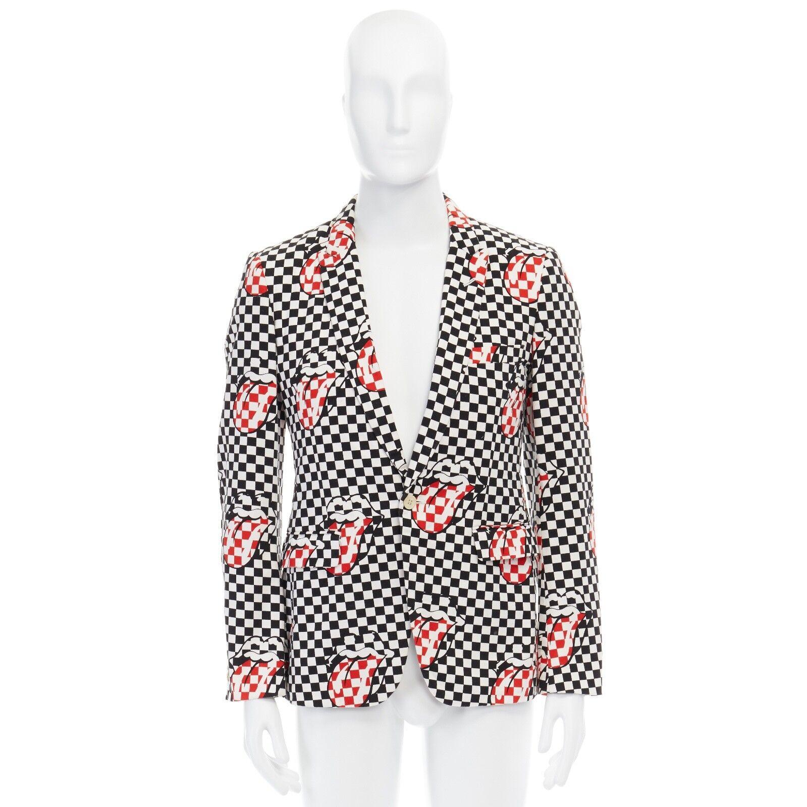 runway COMME DES GARCONS HOMME PLUS SS2006 Rolling Stones lips blazer jacket S 
Reference: ANSN/A00034 
Brand: Comme Des Garcons 
Designer: Rei Kawakubo 
Collection: Spring Summer 2006 Runway 
Material: Cotton 
Color: Black 
Pattern: Check 
Extra