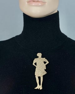 Runway Fall 2010 YVES SAINT LAURENT YSL Woman Silhouette Brooch