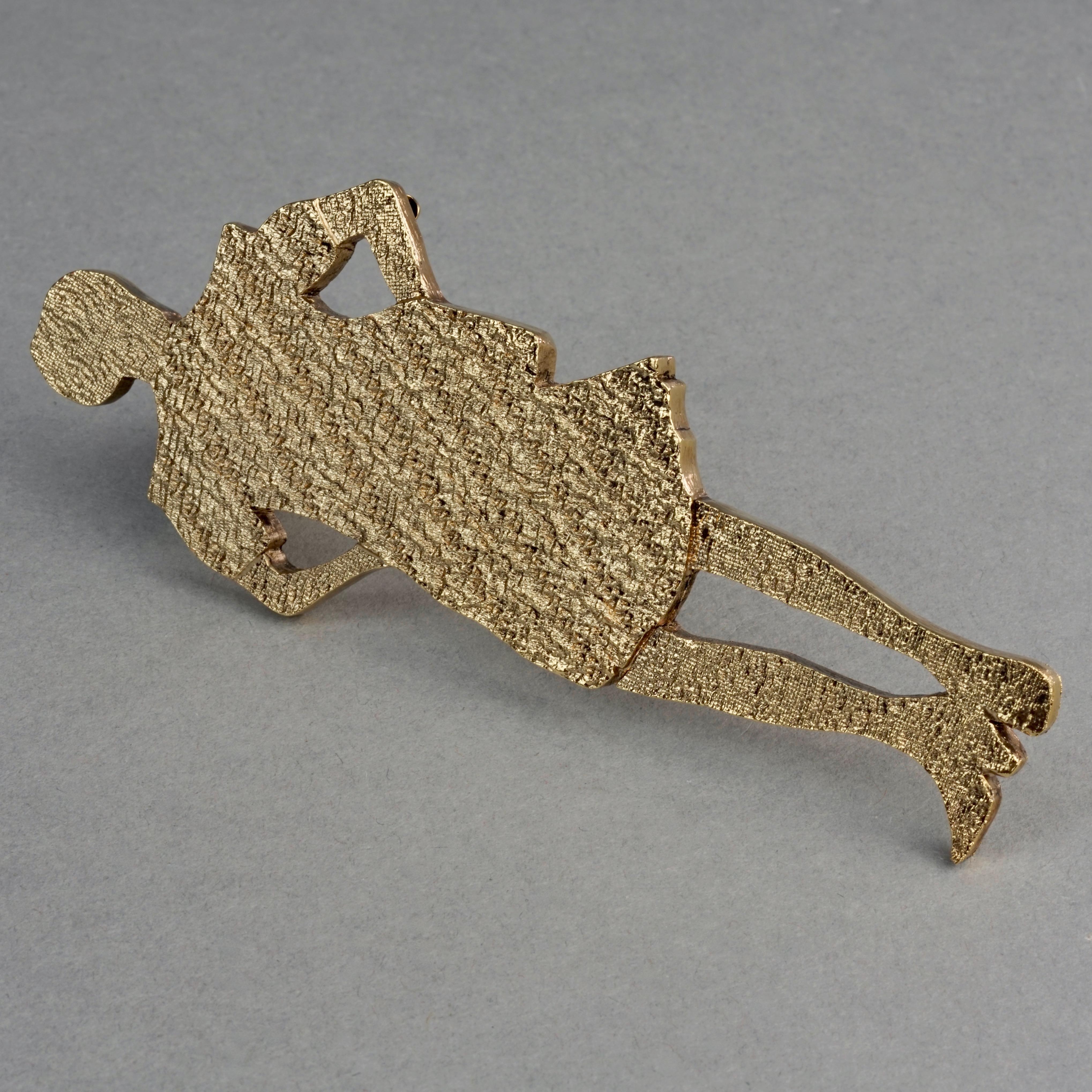 brooch with lady silhouette