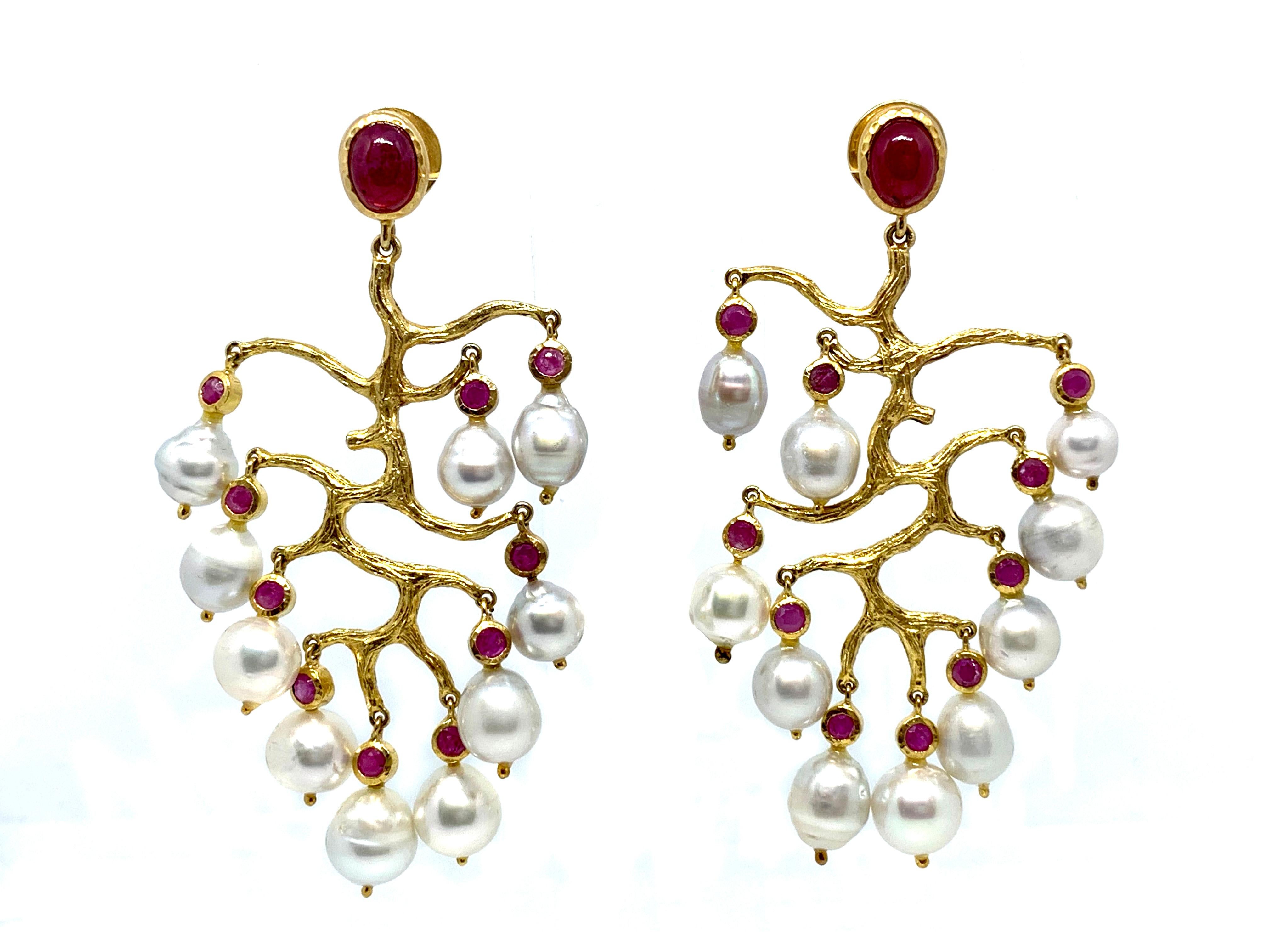 Runway Genuine Ruby and Australian South Sea Pearl Branch Chandelier Earrings

These gorgeous pair of earrings feature 20 pieces of high luster Australian south sea pearls and faceted round genuine rubies on the sterling branch,  genuine