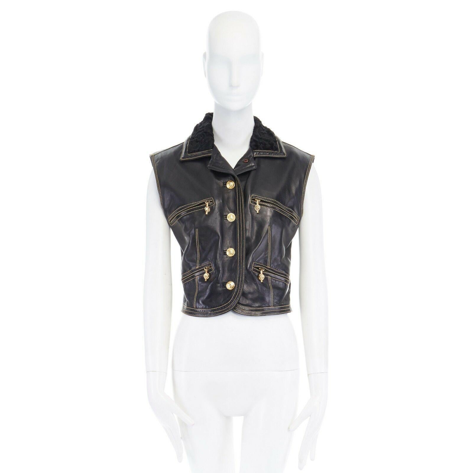 runway GIANNI VERSACE AW92 Miss SM black fur collar leather Medusa vest jacket S

GIANNI VERSACE
FROM THE FALL WINTER 2002 MISS S&M RUNWAY/CAMPAIGN
Black leather . Soft lambskin leather . Shearling fur collar . 
Contrast yellow stitching throughout