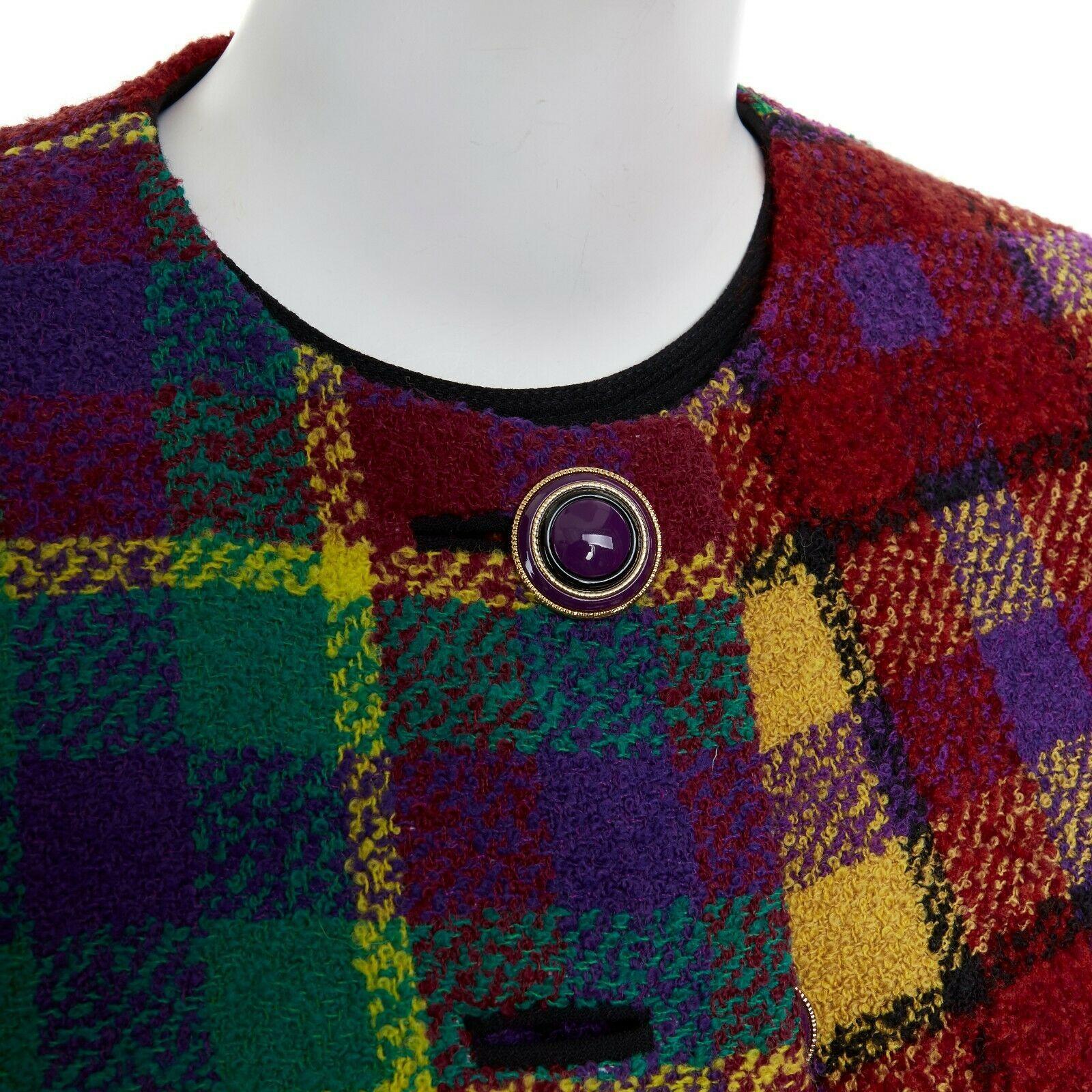 runway GIANNI VERSACE Vintage AW91 multicolor plaid check jacket skirt set S US4

GIANNI VERSACE VINTAGE
FROM THE FALL WINTER 1991 RUNWAY
WOOL, VIRGIN WOOL, NYLON, MOHAIR . MULTICOLORED CHECKS . 
GOLD PURPLE BUTTON ON COAT . DUAL SLIT POCKET AT