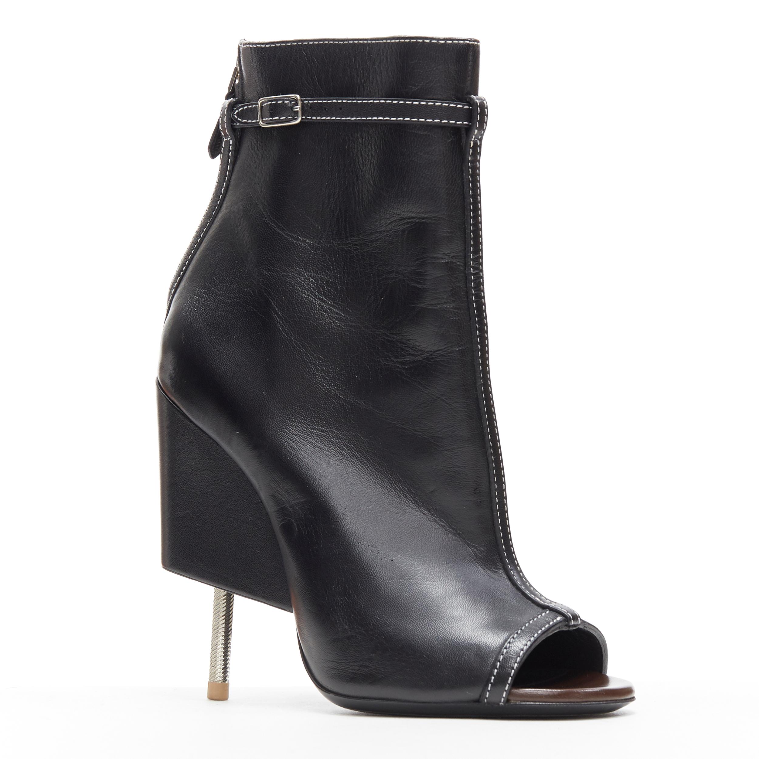 runway GIVENCHY TISCI black leather overstitched peep toe nail heel bootie EU38
Brand: Givenchy
Designer: Riccardo Tisci
Model Name / Style: Bootie
Material: Leather
Color: Black
Pattern: Solid
Closure: Zip
Extra Detail: Ultra High (4 in & Higher)