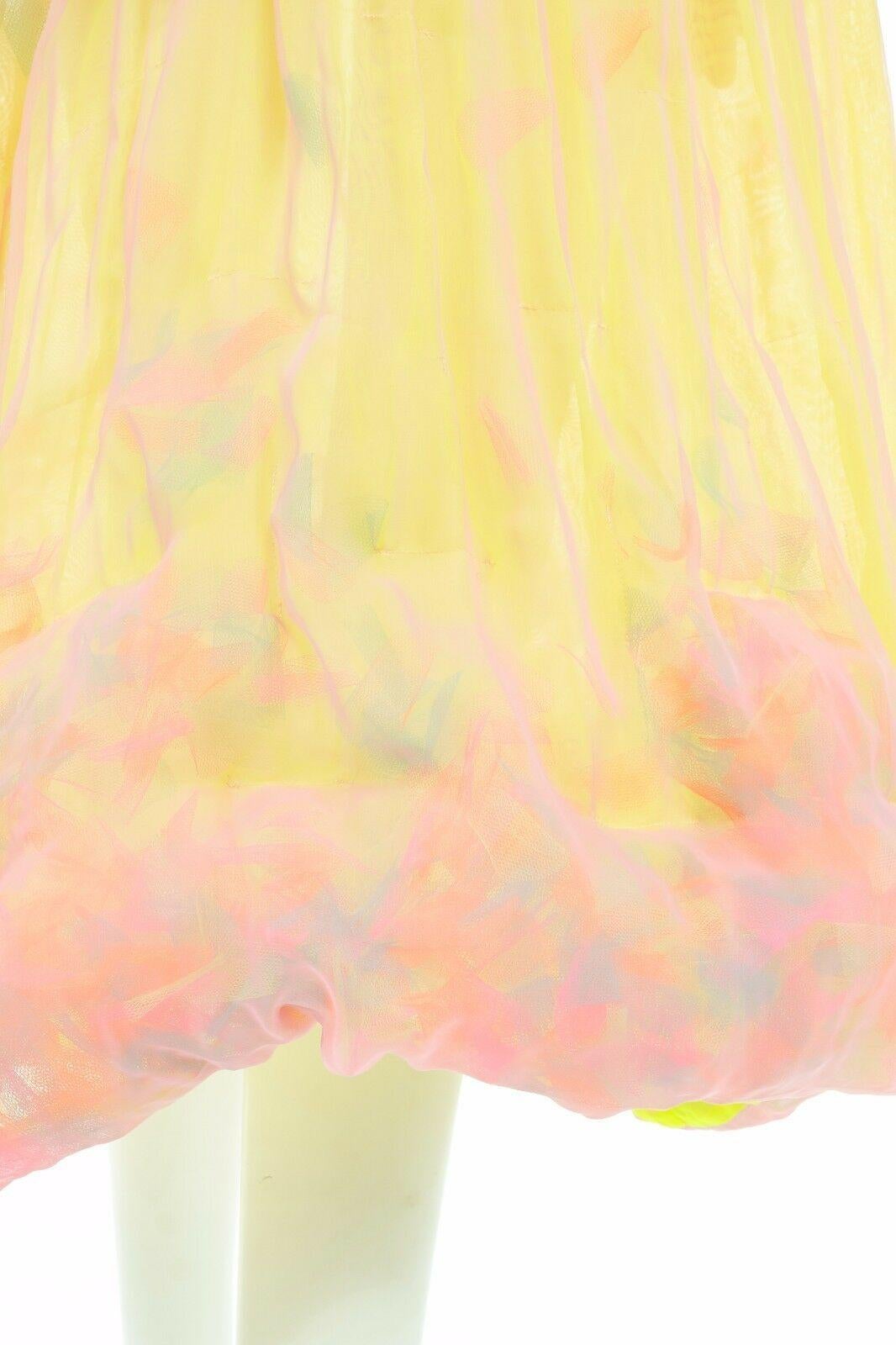 runway ISSEY MIYAKE Vintage SS01 pleated orange pink silk confetti bubble dress
ISSEY MIYAKE
FROM THE SPRING SUMMER 2001 COLLECTION
Yellow pink pleated silk. Dual layered. 
Multicolored tulle pieces confetti trapped in between the layers. U