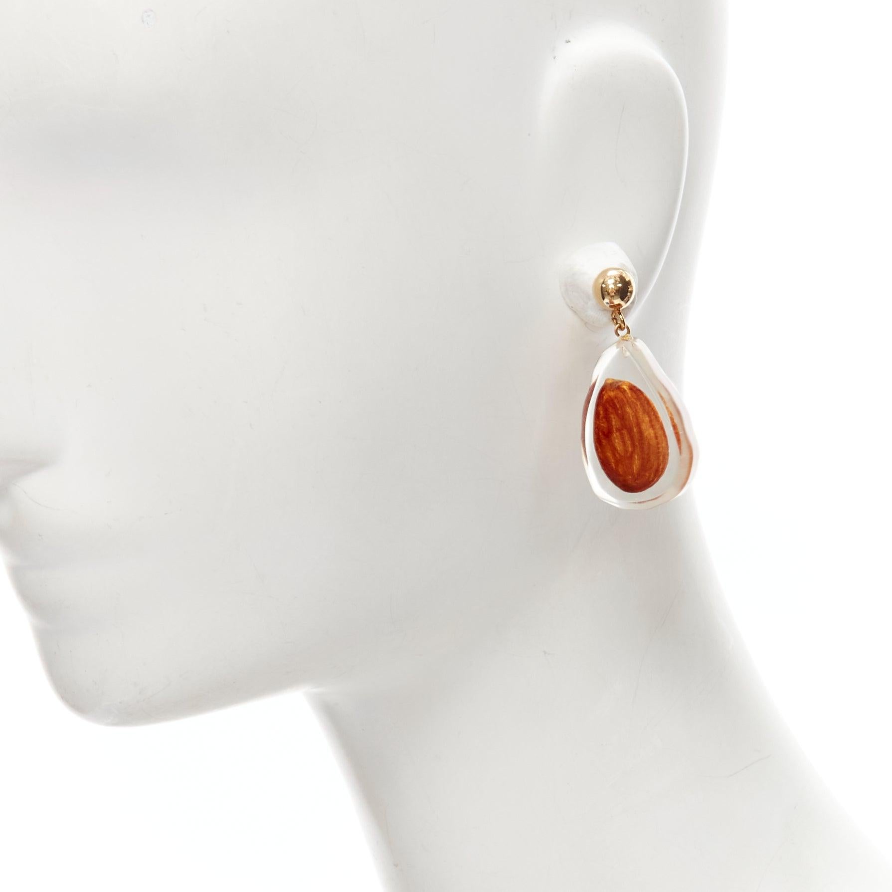 runway JACQUEMUS Les Amandes clear acrylic asymmetric almond drop earrings For Sale 1