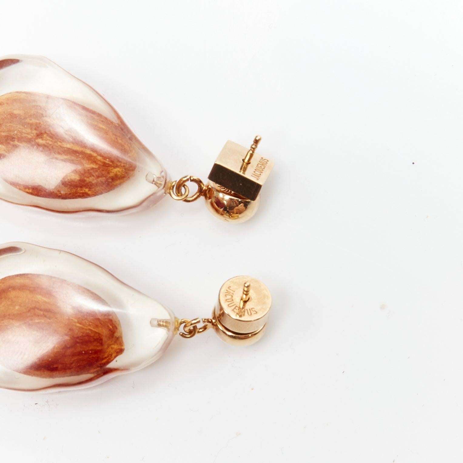 runway JACQUEMUS Les Amandes clear acrylic asymmetric almond drop earrings For Sale 3
