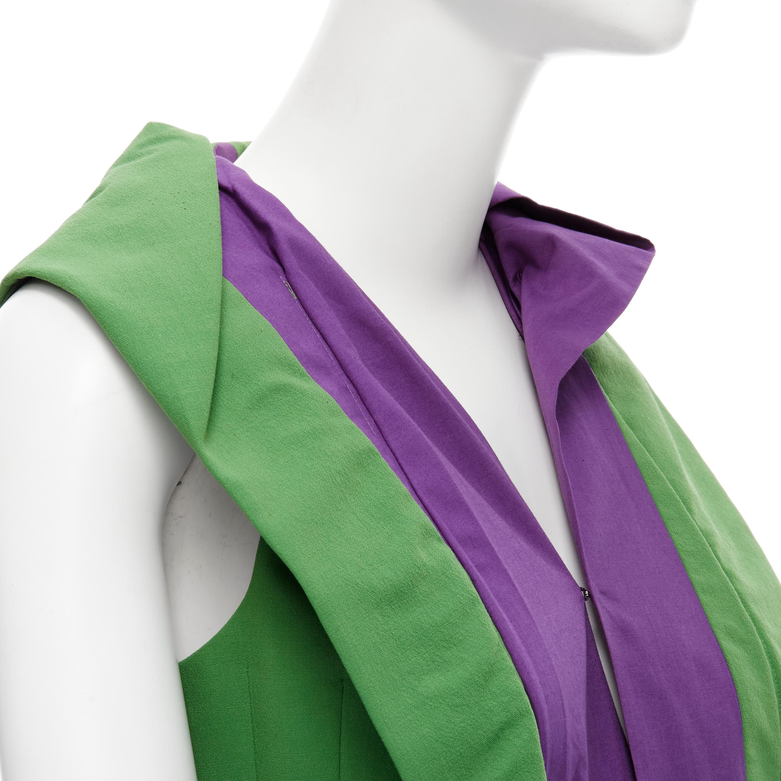 runway JUNYA WATANABE 1996 purple green pleat collar panelled corset vest 
Reference: CRTI/A00320 
Brand: Junya Watanabe 
Designer: Junya Watanabe 
Collection: 1996 
Material: Wool 
Color: Green 
Pattern: Solid 
Closure: Hook & Eye 
Extra Detail: