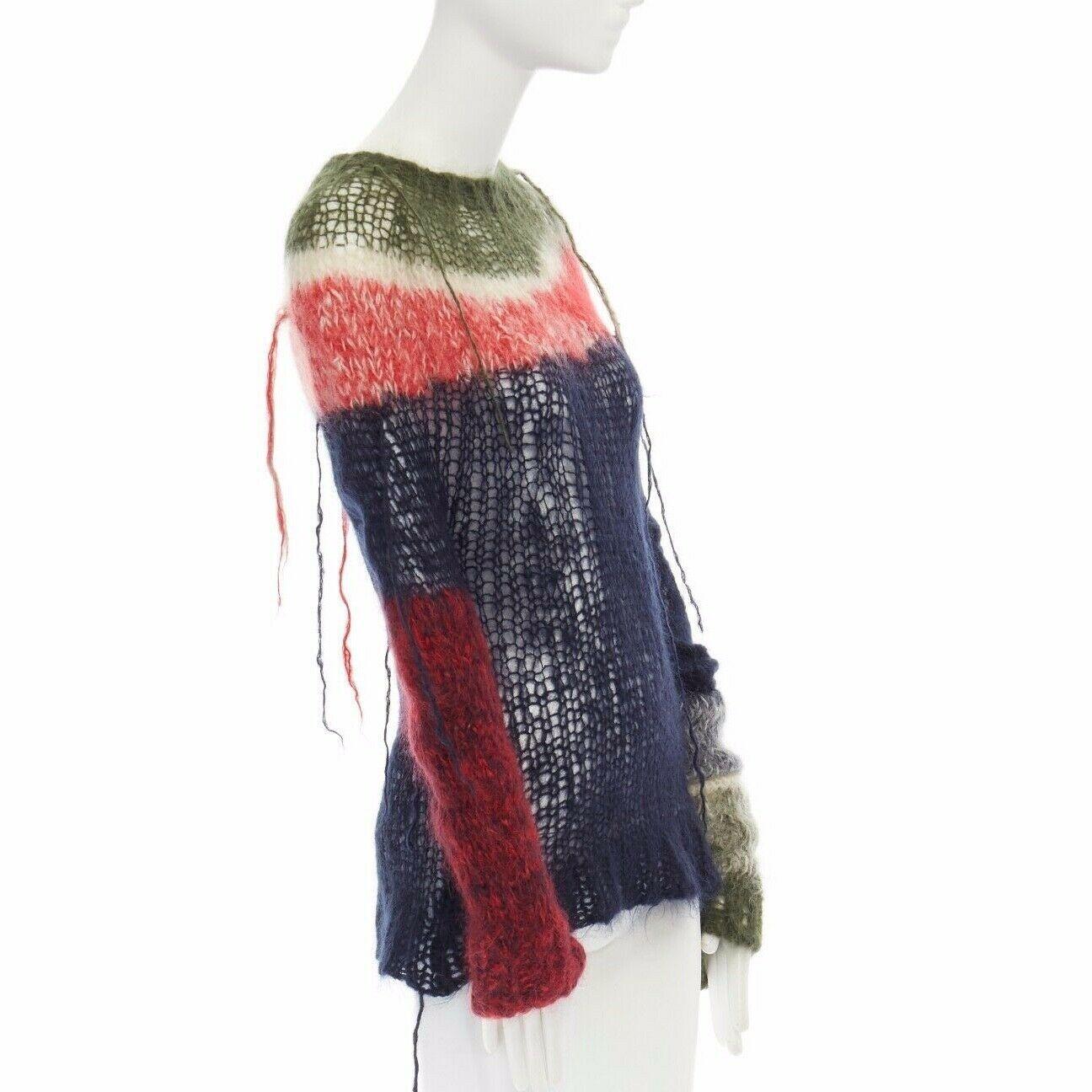 runway JUNYA WATANABE AW2006 punk green red blue loose wool knit sweater top S

JUNYA WATANABE
AS SEEN ON RUNWAY AUTUMN WINTER 2006
PART OF THE PERMANENT COLLECTION OF THE METROPOLITAN MUSEUM, NYC
SHOWCASED IN THE MET'S 