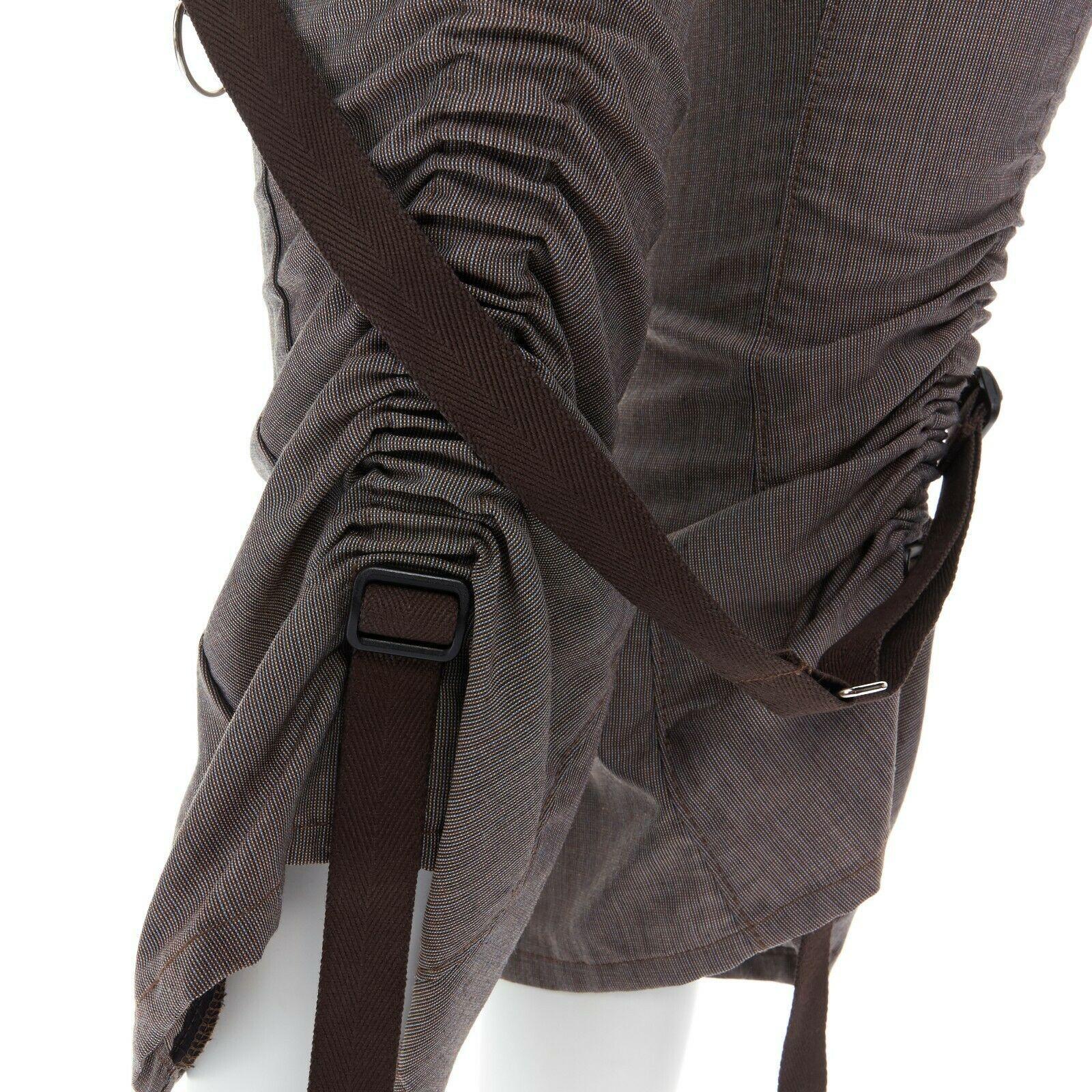 runway JUNYA WATANABE SS2003 Parachute brown bondage harness buckle belt pants S

JUNYA WATANABE COMME DES GARCONS
FROM THE SPRING SUMMER 2002 COLLECTION
WOOL, COTTON . GREYISH BROWN PANTS . CONTRAST BROWN RIBBON STRAPS THROUGHOUT . 
PARACHUTE