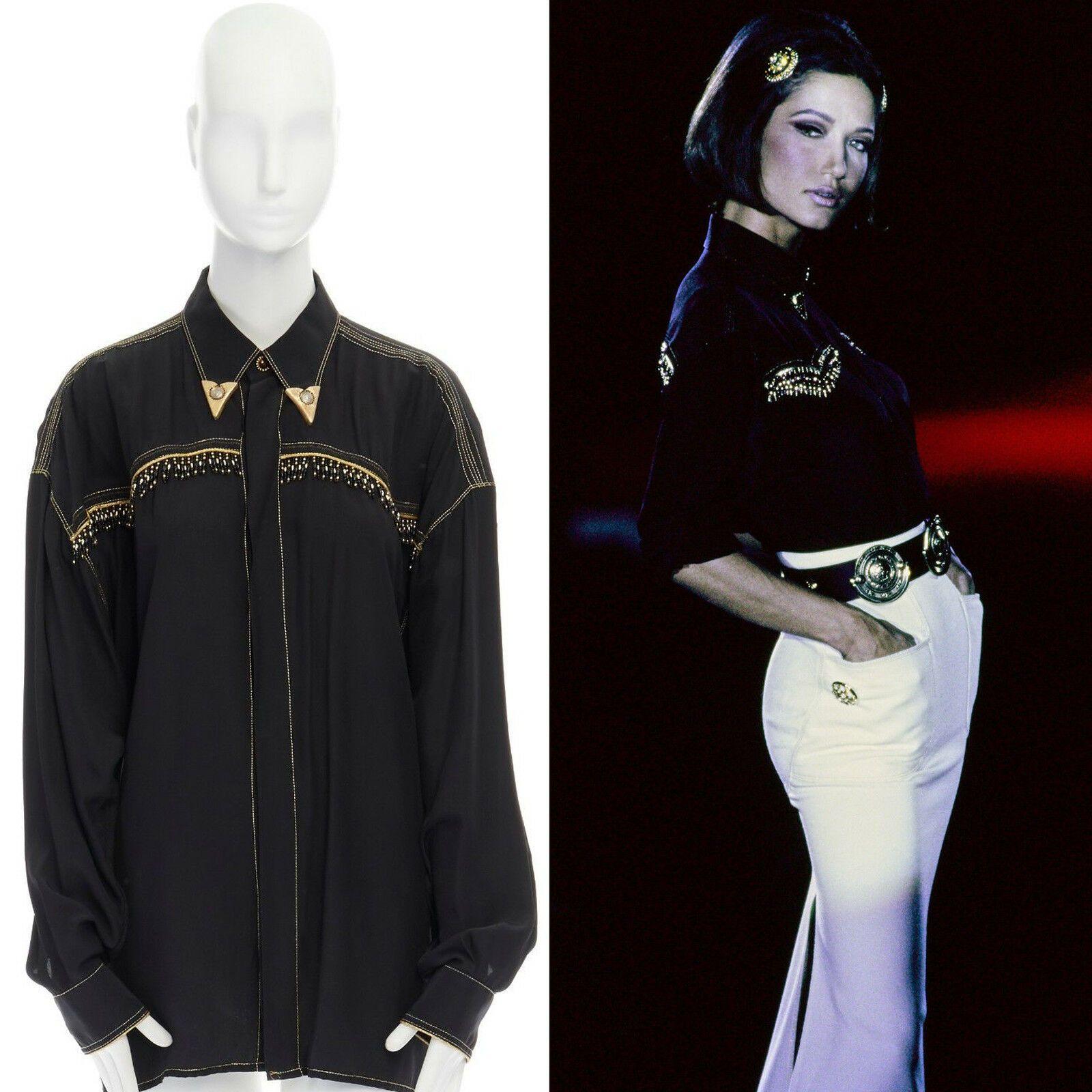 runway VERSACE AW92 black fringe beaded gold metal collar oversized shirt top
GIANNI VERSACE
FROM THE FALL WINTER 1992 'MISS S&M' COLLECTION
RE-EDITIONED AND WORN BY DONATELLA VERSACE in SPRING SUMMER 2018 COLLECTION
Rayon, silk, viscose. Black with