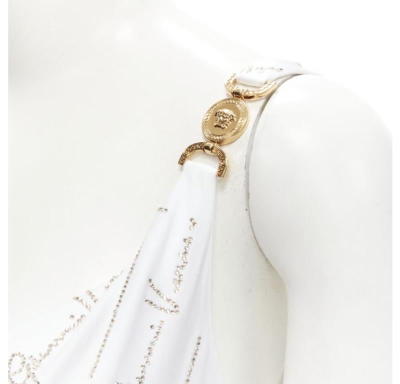 Runway VERSACE Gianni Signature white silver crystal Medusa dress IT44 L
Reference: TGAS/C01170
Brand: Versace
Designer: Donatella Versace
Model: Gianni Versace Signature
Collection: Resort 2020 - Runway
Material: Viscose
Color: White,