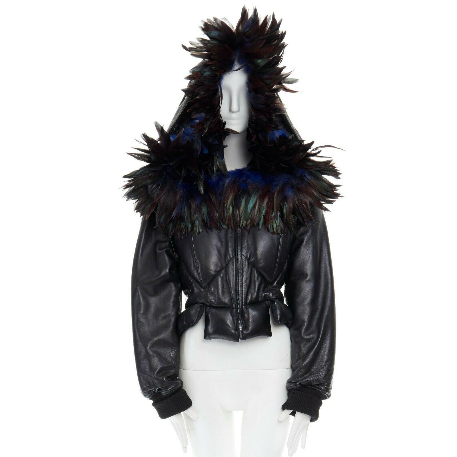 runway YOHJI YAMAMOTO 1991 black padded leather oversized feather hood down M 
Reference: ANSN/A00168 
Brand: Yohji Yamamoto 
Designer: Yohji Yamamoto 
Collection: Fall Winter 2005 Runway 
Material: Leather 
Color: Black 
Pattern: Solid 
Closure:
