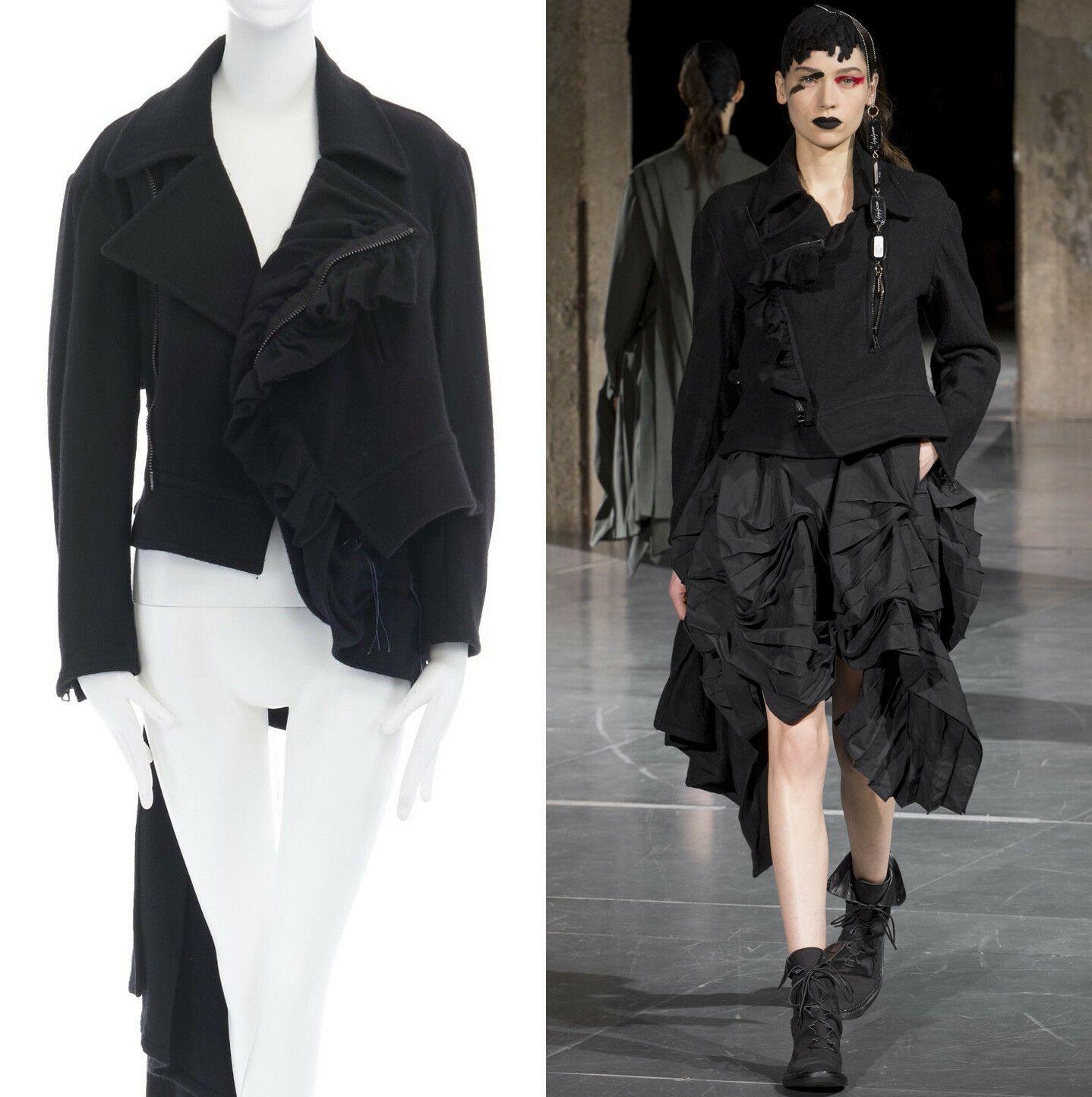 runway YOHJI YAMAMOTO AW17 black wool ruffle trimmed draped back biker jacket M
YOHJI YAMAMOTO
FROM THE FALL WINTER 2017 RUNWAY
Woo, nylon, polyester, Black. Rounded notched oversized spread collar. Ruffle trimming. 
Asymmetric zip front closure,