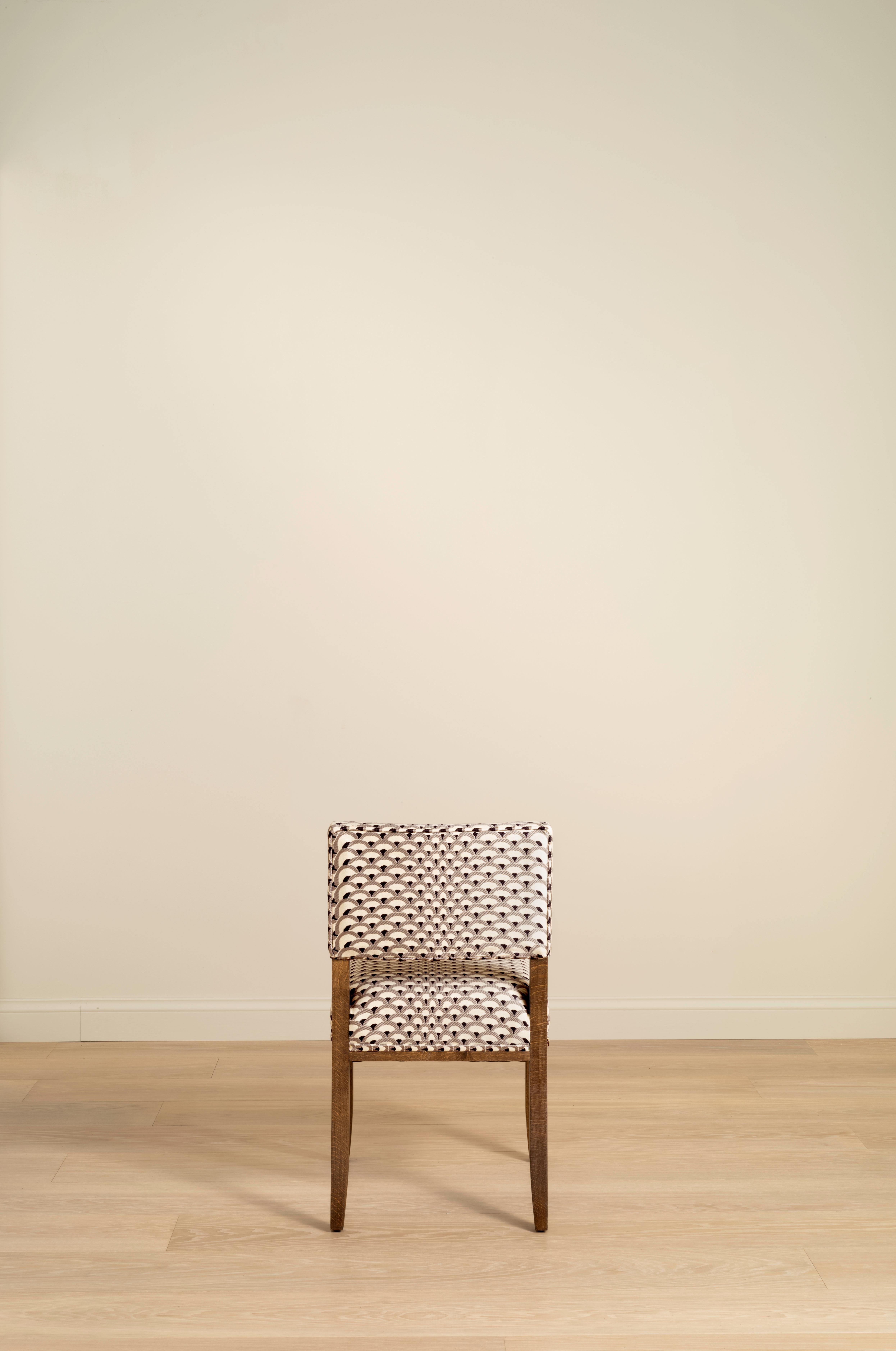 A dining chair in the 1940s style; simple and clean in design. Upholstered seat and back in clients’ own fabric with an Oak frame available in a Light, Mid, Dark and Ebonised finish.
​
Available to view in our London Showroom.