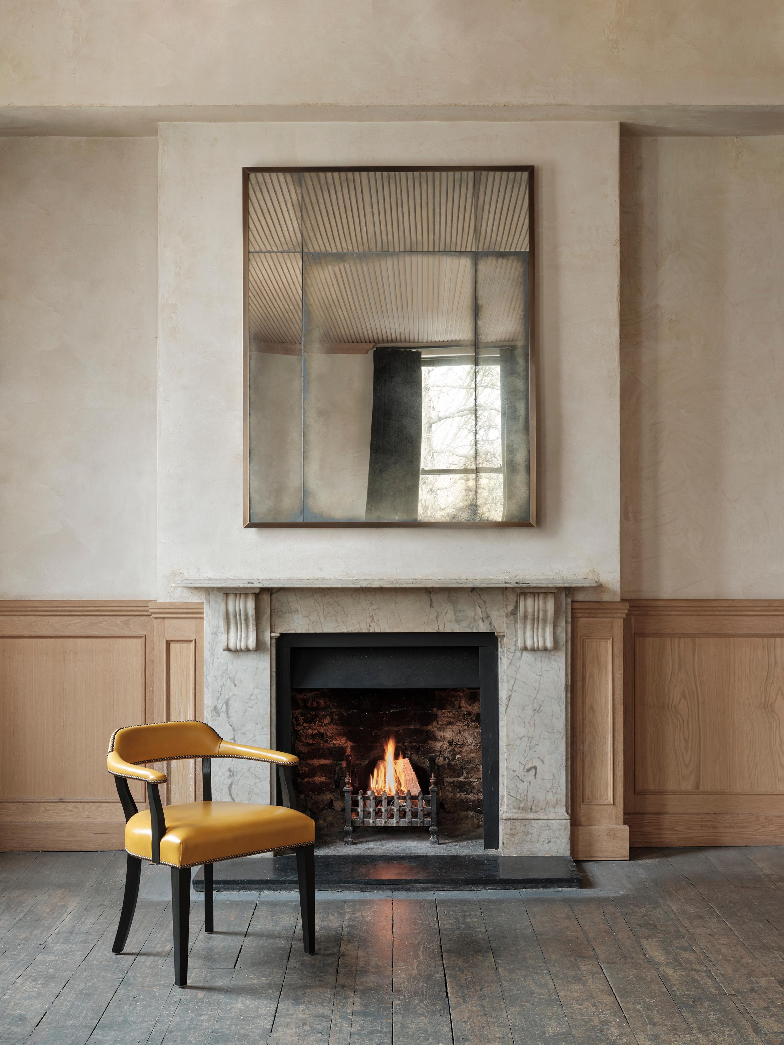 A signature piece for Rupert Bevan, our elegant Art Deco overmantel mirror features a patinated brass angle frame with lightly antiqued mirror glass panels.

Handcrafted in our Shropshire workshops, each mirror is made with hidden split batten wall