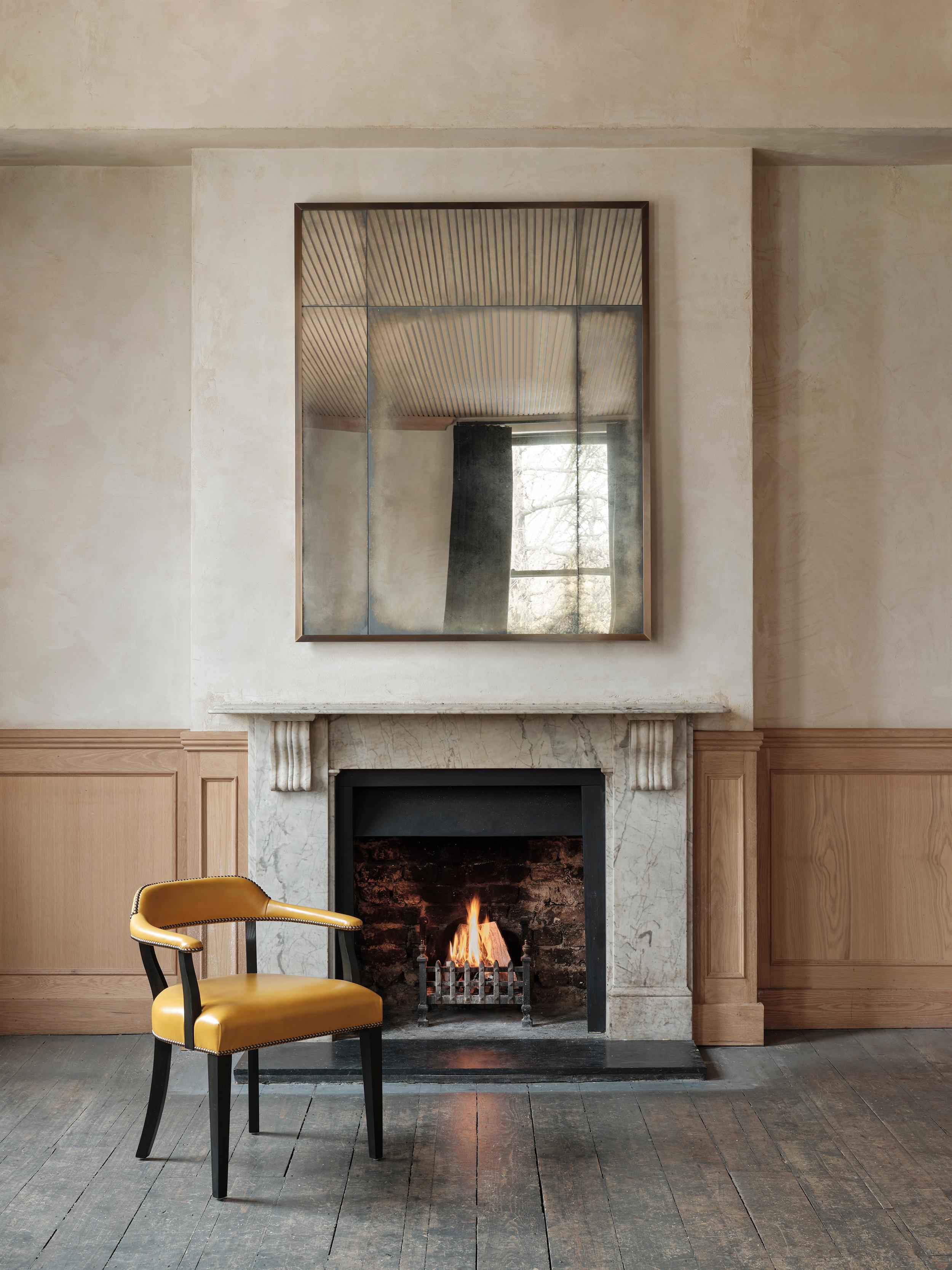 A signature piece for Rupert Bevan, our elegant Art Deco Overmantel Mirror features a patinated brass angle frame with lightly antiqued mirror glass panels.

Handcrafted in our Shropshire Workshops, each mirror is made with hidden split batten wall