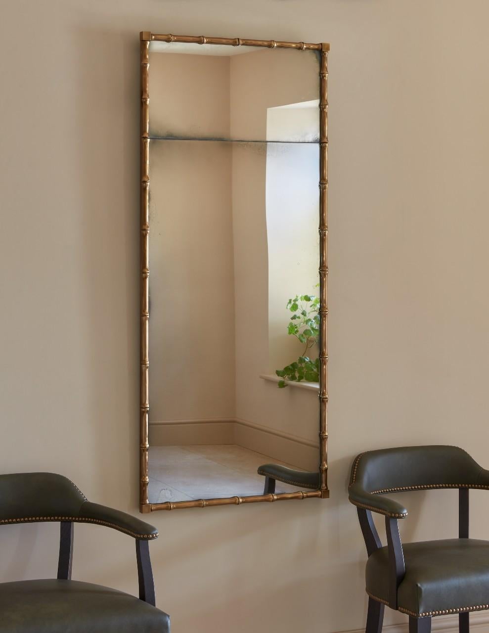 The Vero Mirror features a hand sculpted solid brass frame that surrounds an antiqued mirror glass centre.