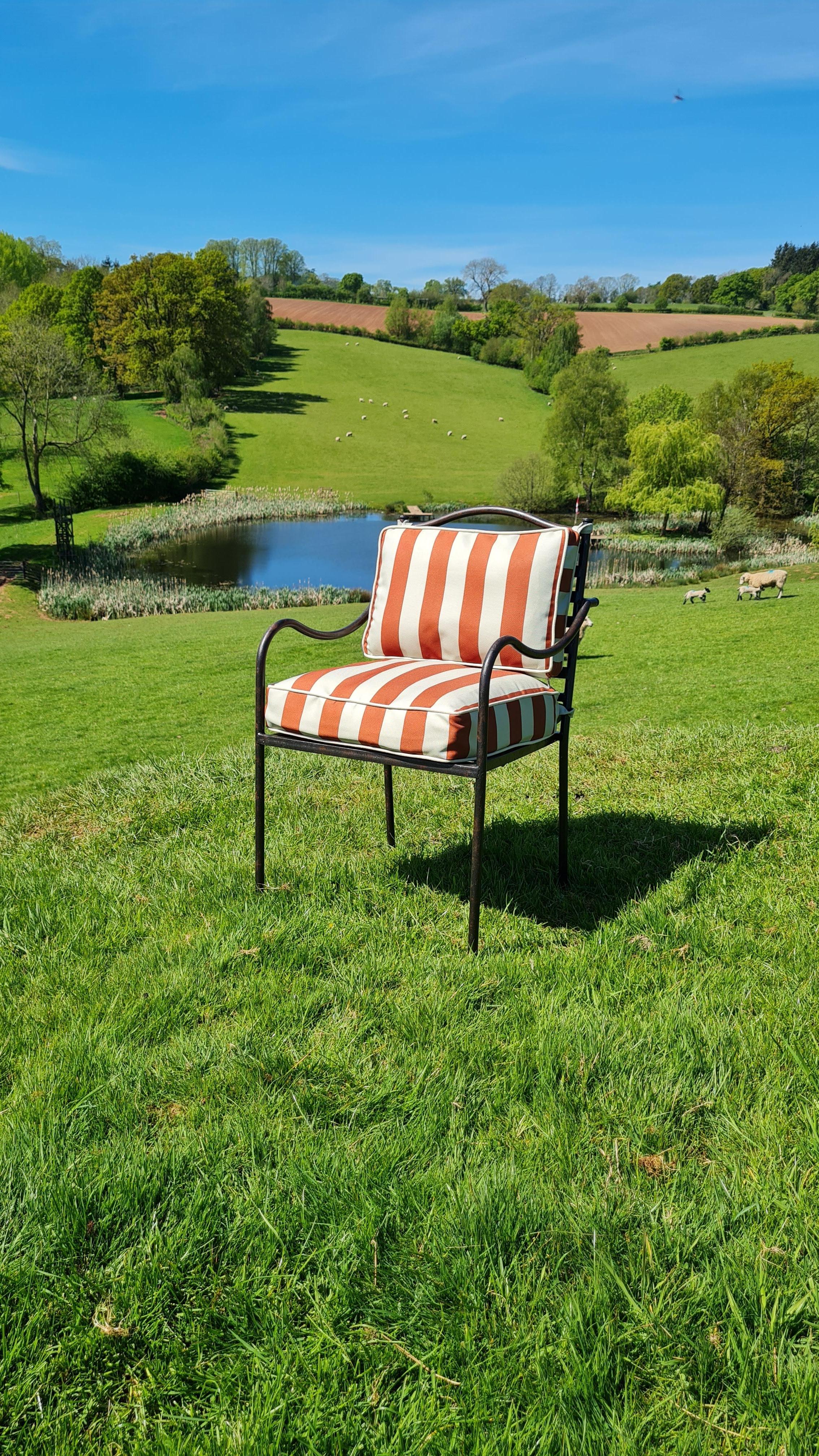 Born from a project in Mayfair with an outdoor terrace, this chair can equally be used in an outdoor, orangery, conservatory or other indoor setting.

The chair’s stylish frame is made from mild steel which is covered in a hardwearing, textured