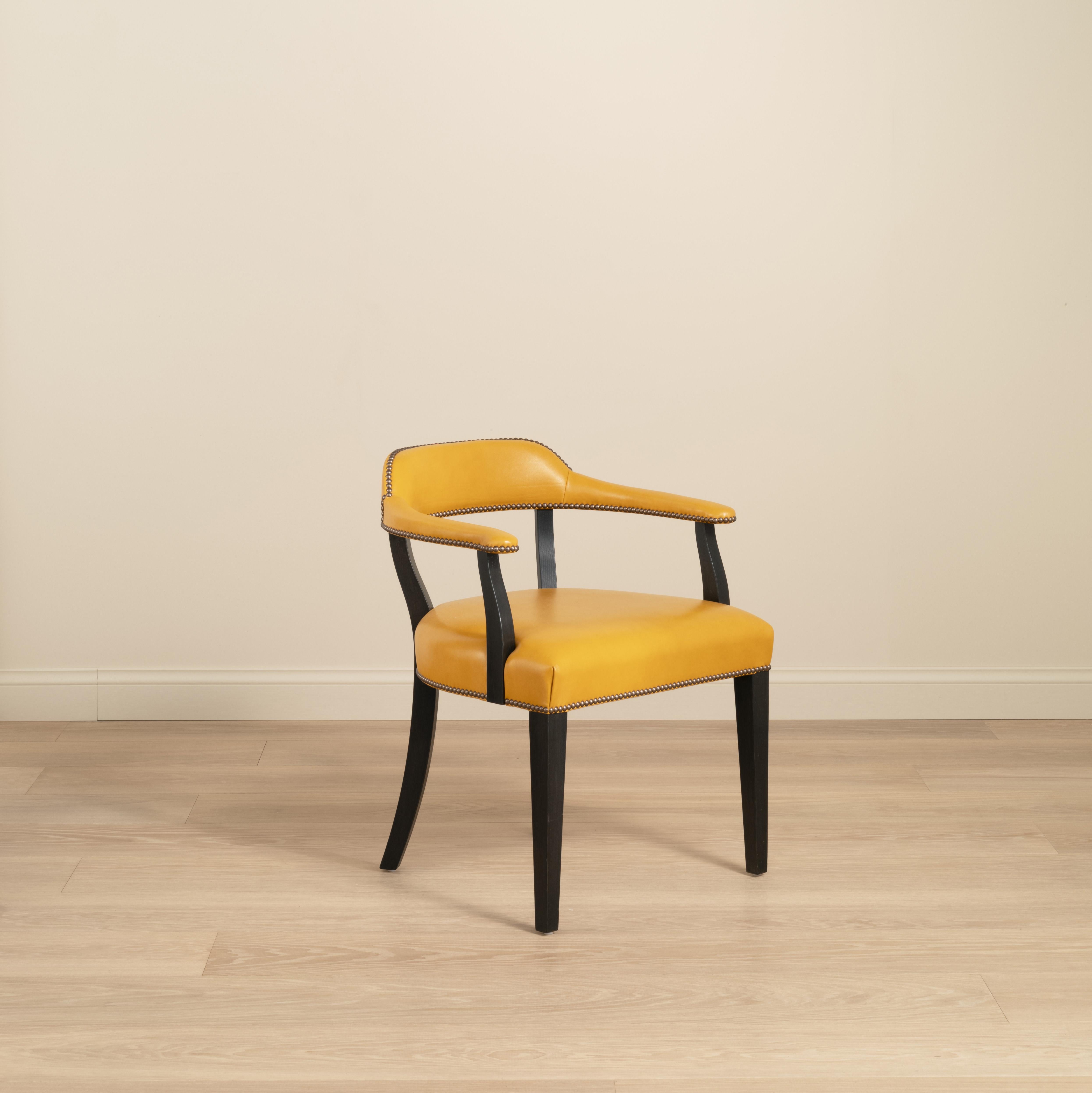Our signature Croft Chair sits comfortably in both traditional and contemporary settings, with its generous seat and elegant backrest. Legs and frame in solid oak with a Light, Mid, Dark or Ebonised finish. Upholstered in clients’ own fabric and/or