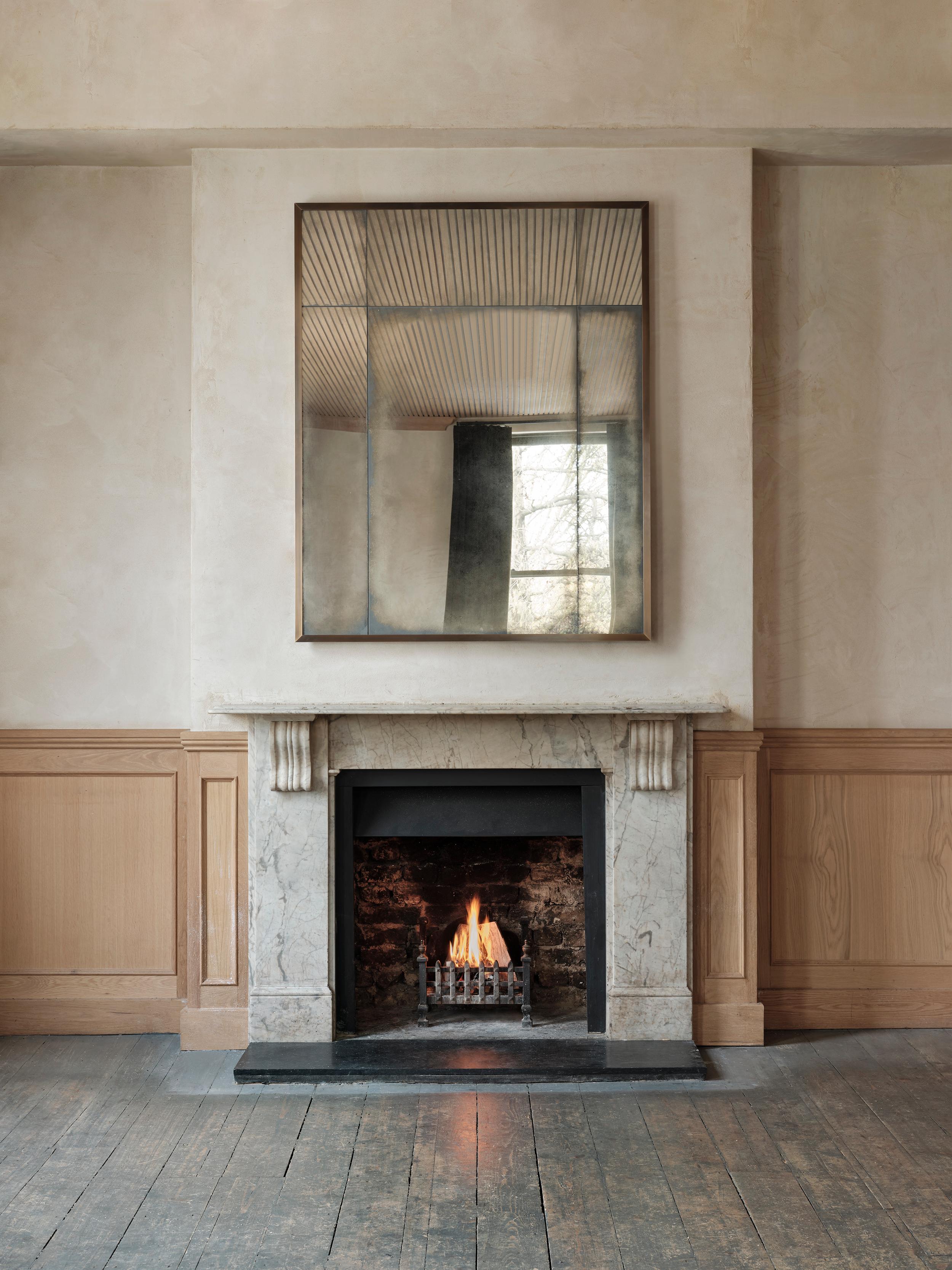 A signature piece for Rupert Bevan, our elegant Art Deco overmantel mirror features a patinated brass angle frame with lightly antiqued mirror glass panels.  

Handcrafted in our Shropshire workshops and available to view in our London showroom.