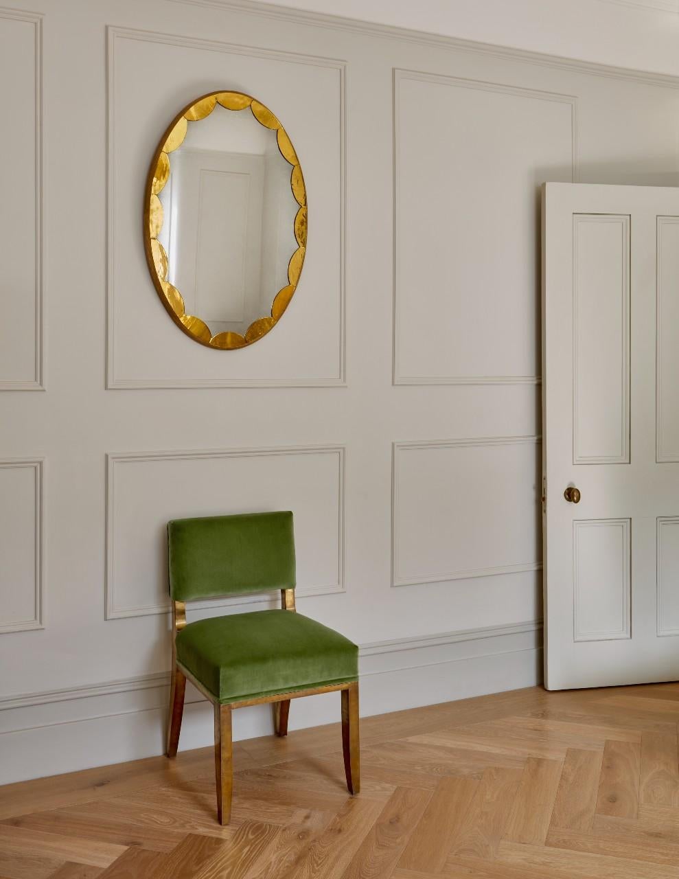 Each mirror is made of cathedral glass scallops carefully placed on a fumed oak frame, surrounding an antiqued mirror glass centre.

Handcrafted in our Shropshire Workshops, each mirror is made with hidden split batten wall fixings.

Available in